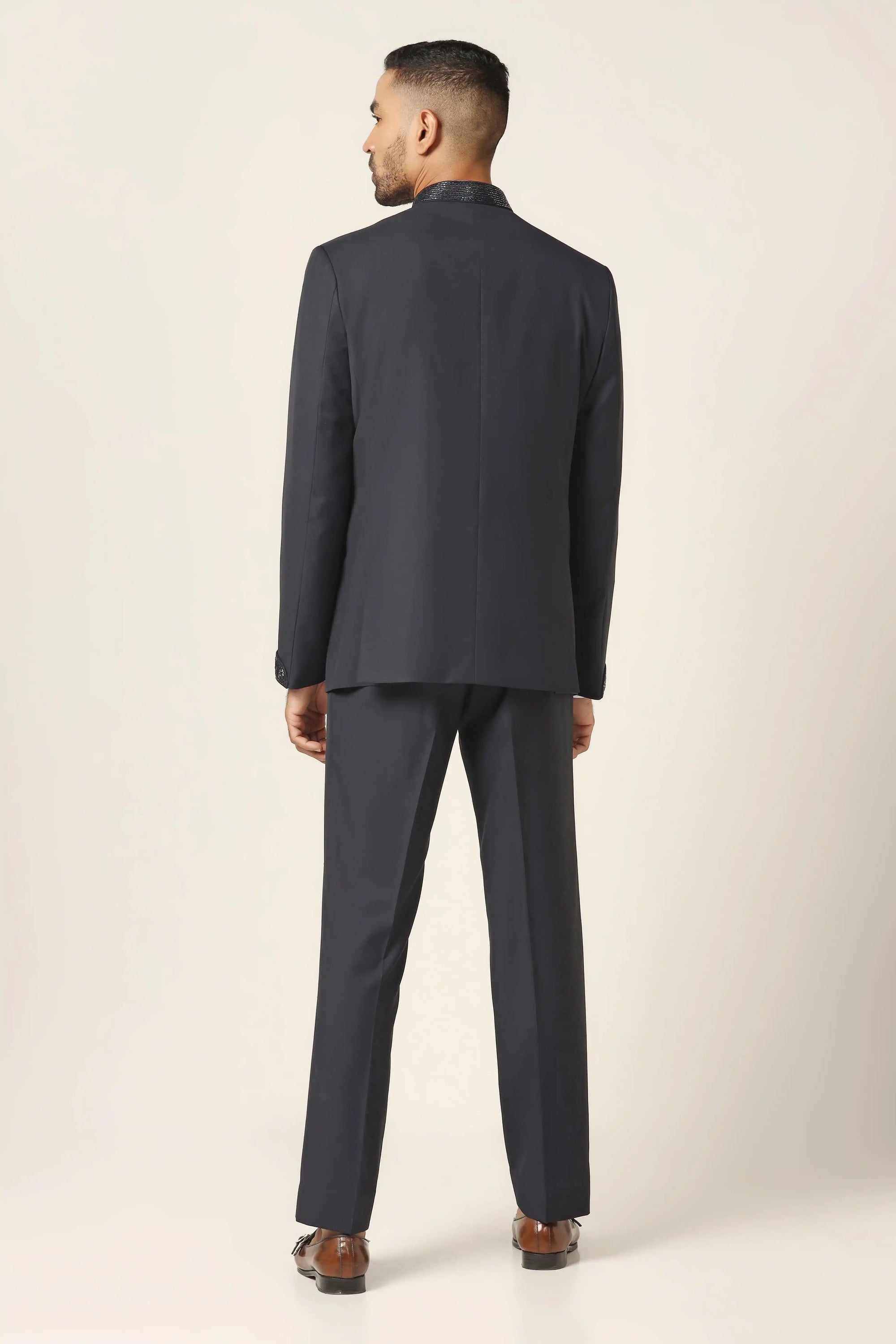Elevate your style with a navy blue suit, crafted to perfection for refined occasions. Shop now!