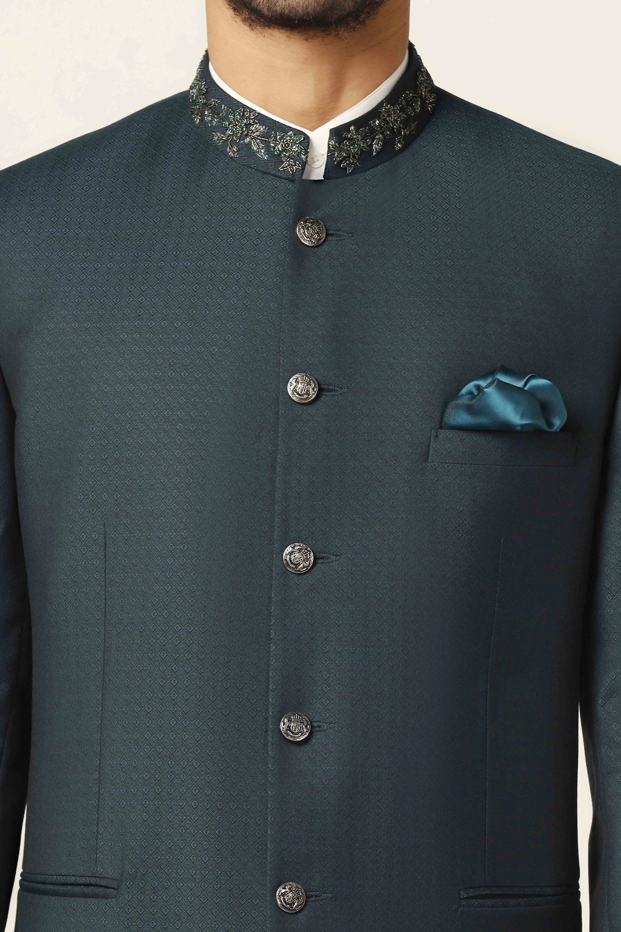 Add sophistication to your collection with a green textured bandhgala suit. Shop now!