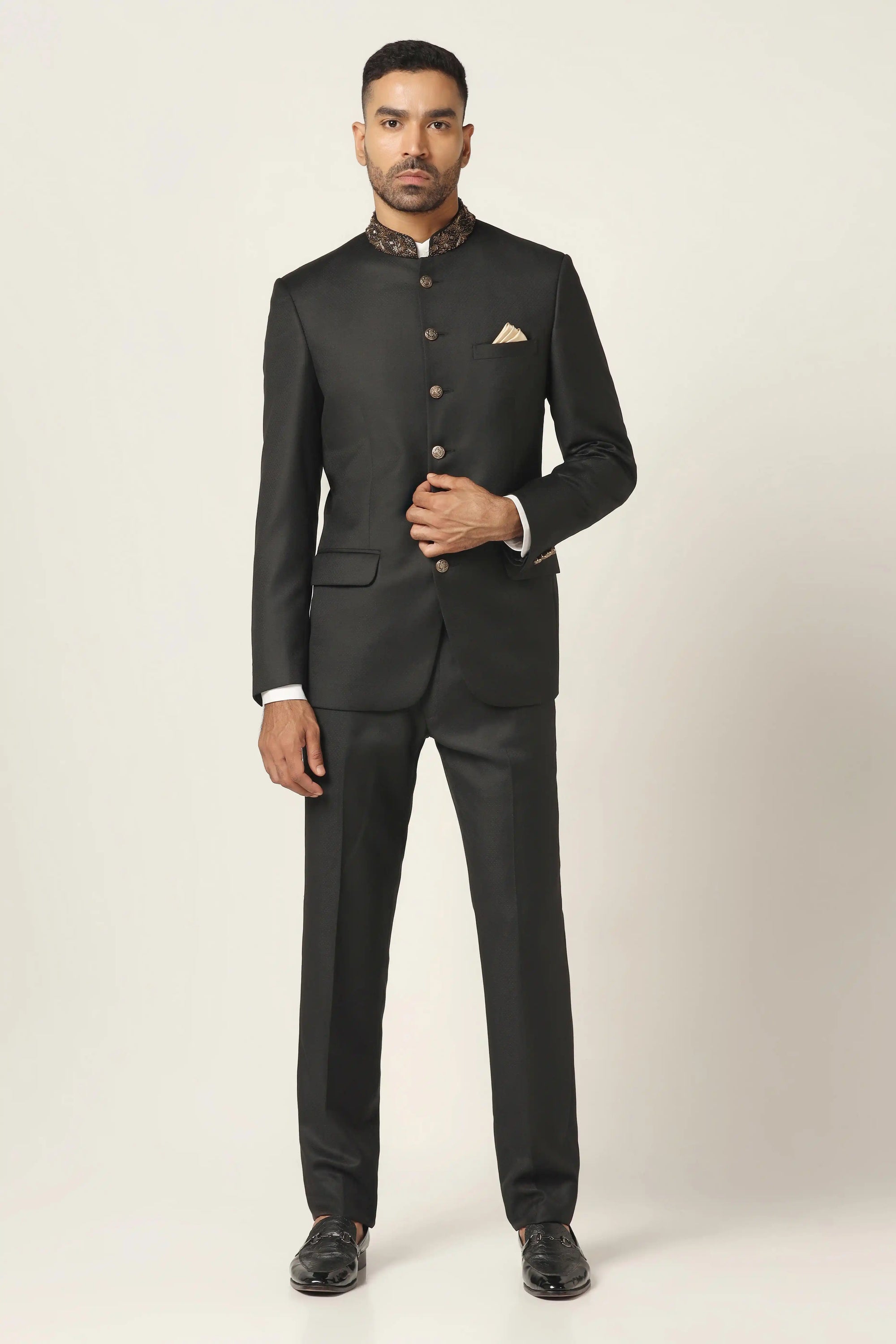 Add refined charm with a black bandhgala suit, delicately embroidered for a rich look. Shop Now!