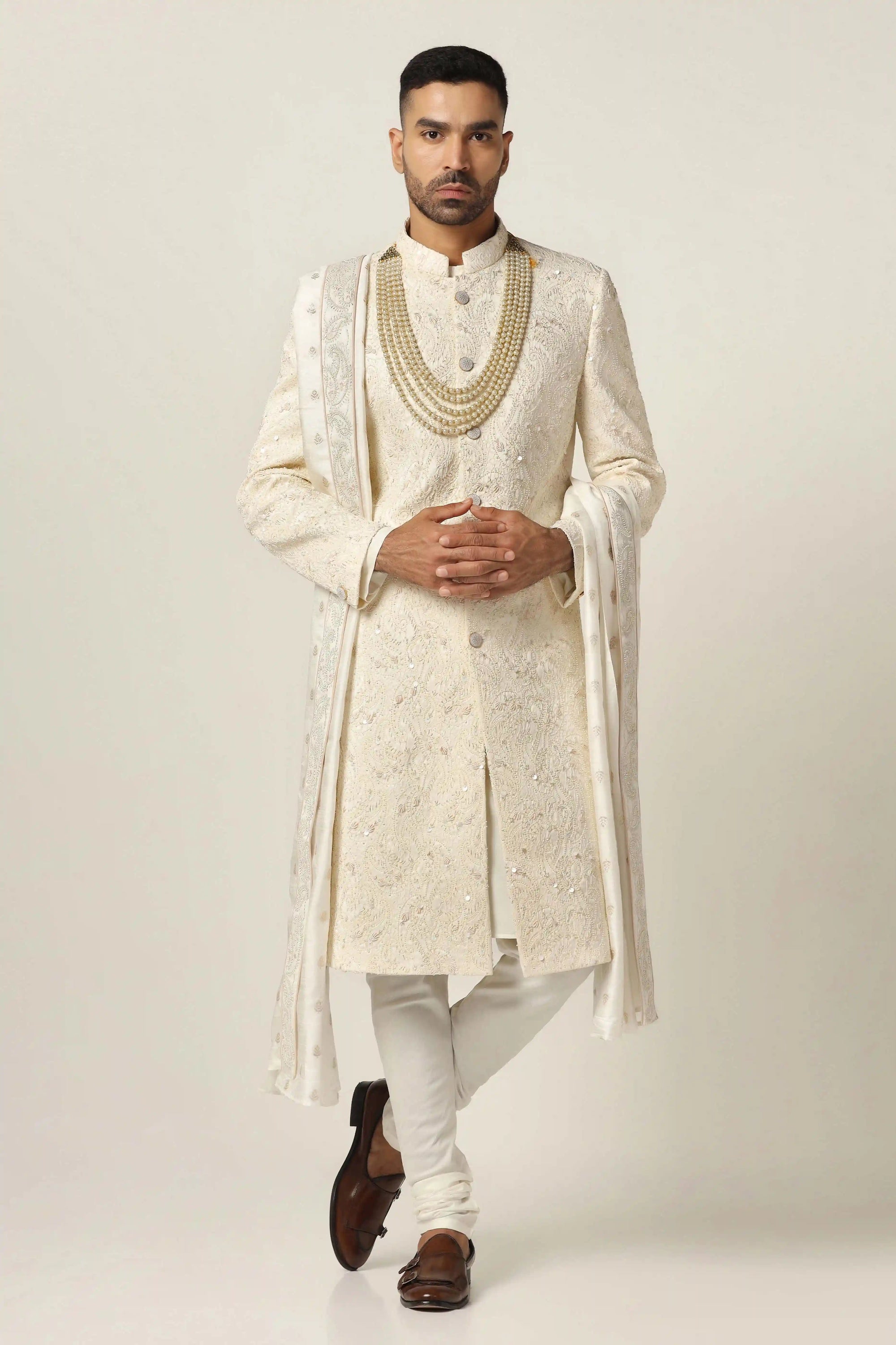 Elevate your ethnic attire with the Off-White Embroidered Sherwani. Shop now!