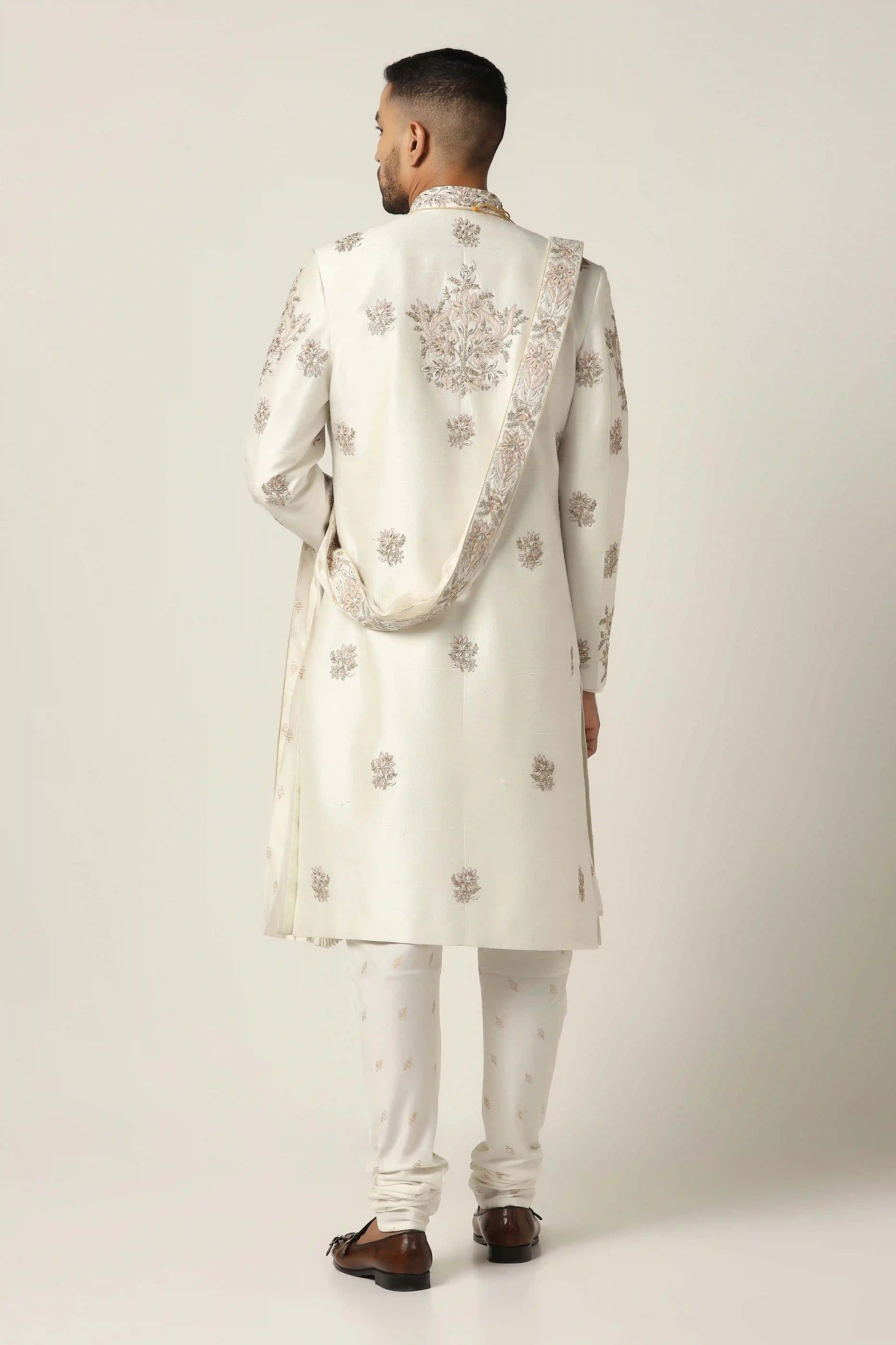 Experience timeless charm with the Zari White Embroidered Sherwani. Shop now!
