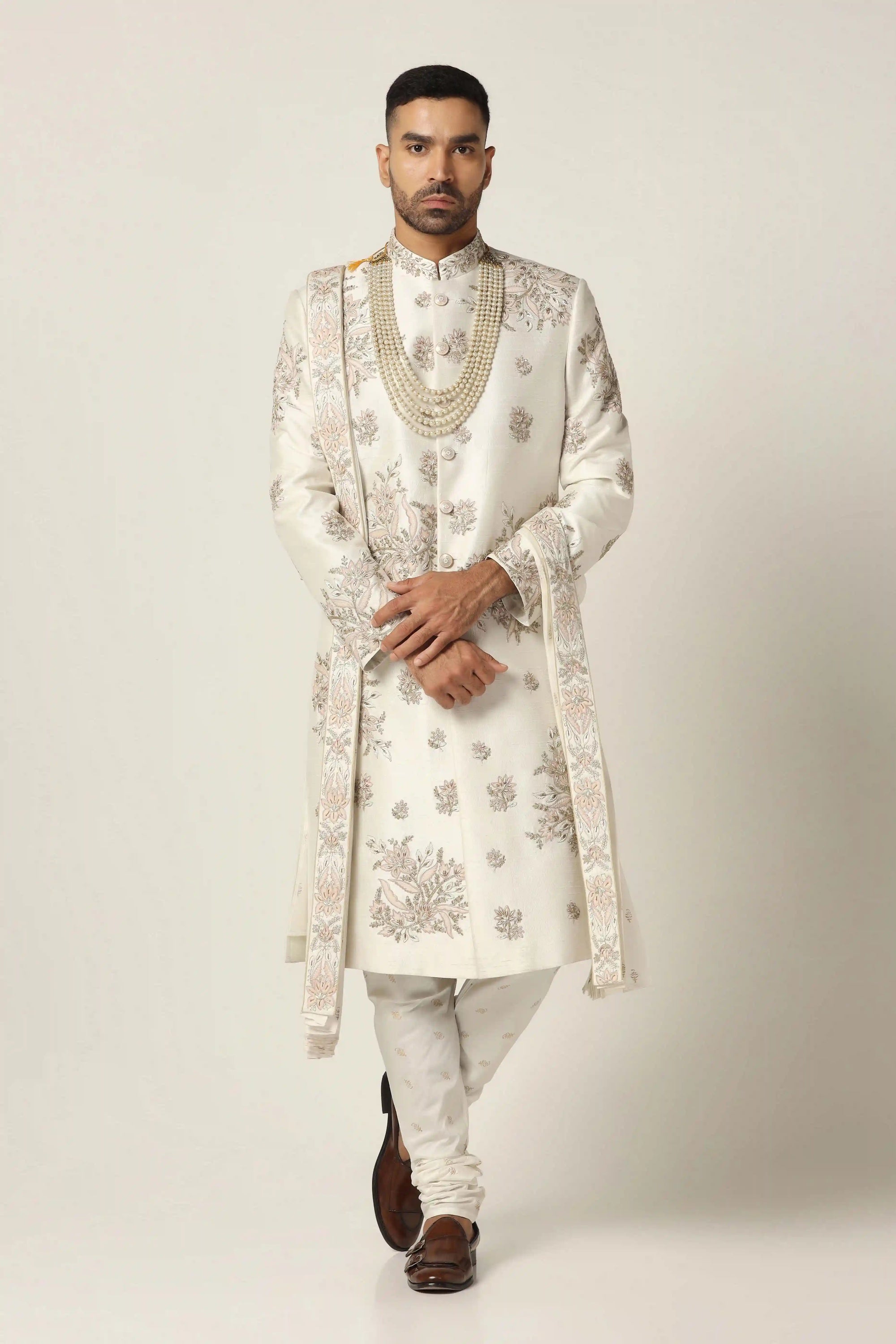 Experience timeless charm with the Zari White Embroidered Sherwani. Shop now!