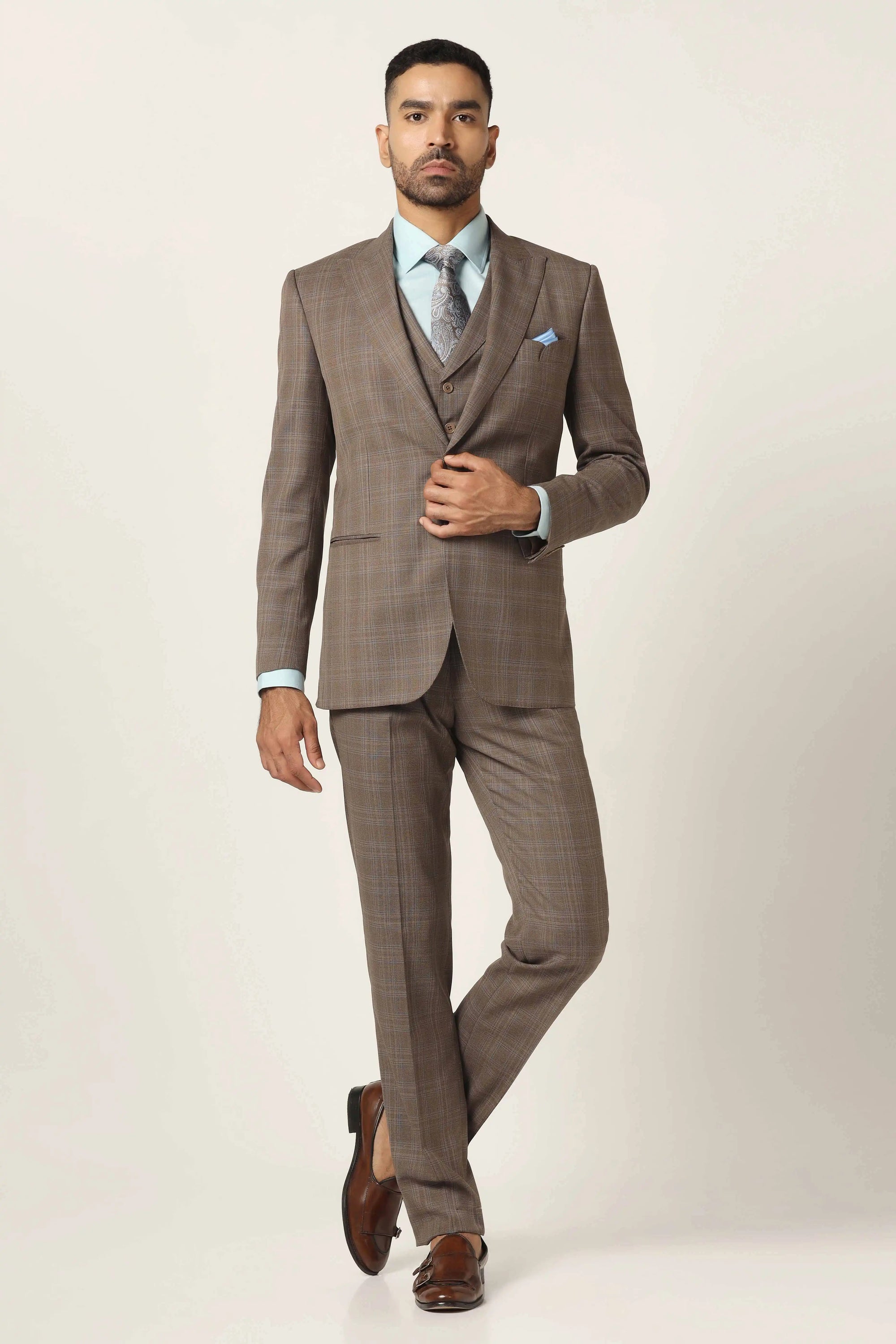 Redefine elegance with this Beige 3-Piece suit. Shop now!