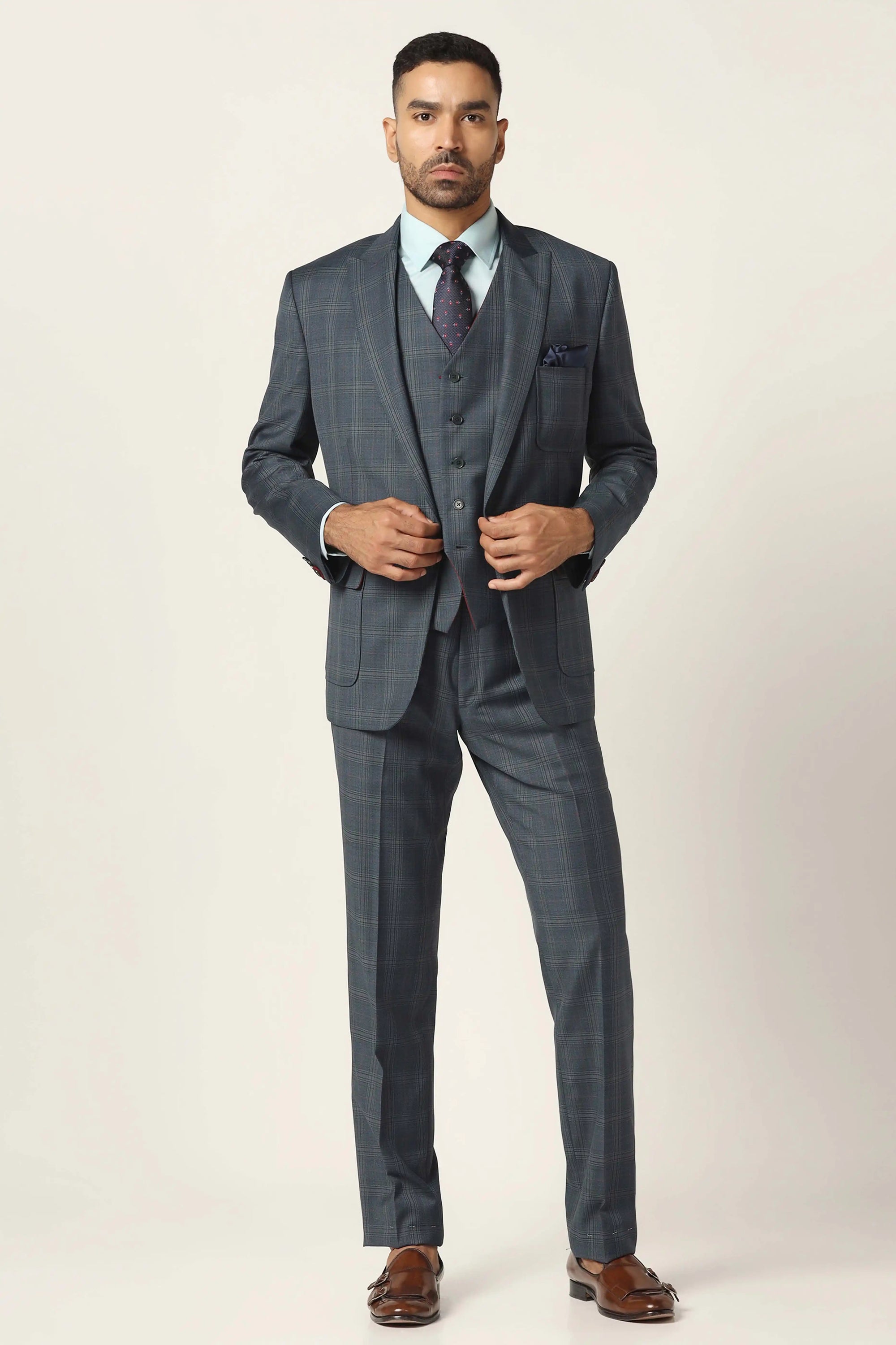 Command attention with our premium navy suit, a perfect blend of style and grace. Shop now!