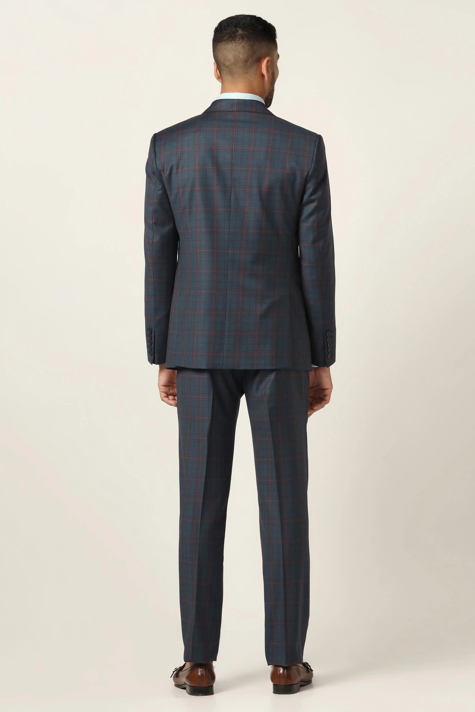 Stand out in the Blue Checked 3-Piece Suit, perfect for a smart, modern look. Shop now!