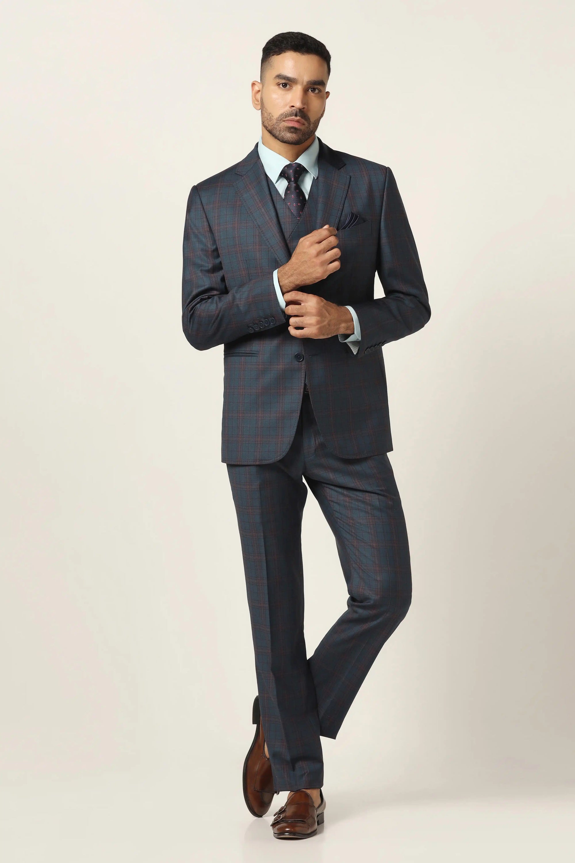 Stand out in the Blue Checked 3-Piece Suit, perfect for a smart, modern look. Shop now!