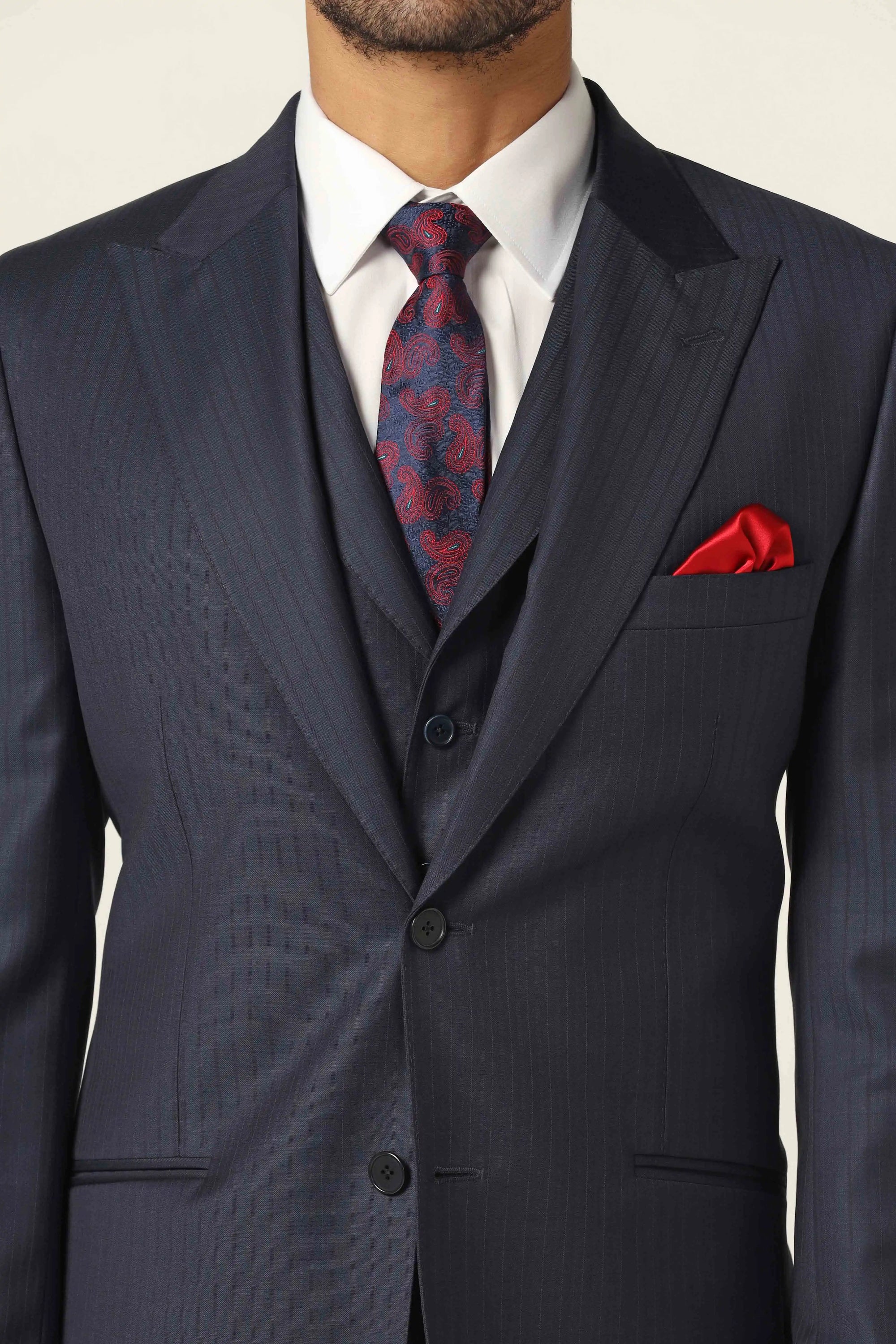 Make bold statement in our navy pinstripe suit. Shop Now!