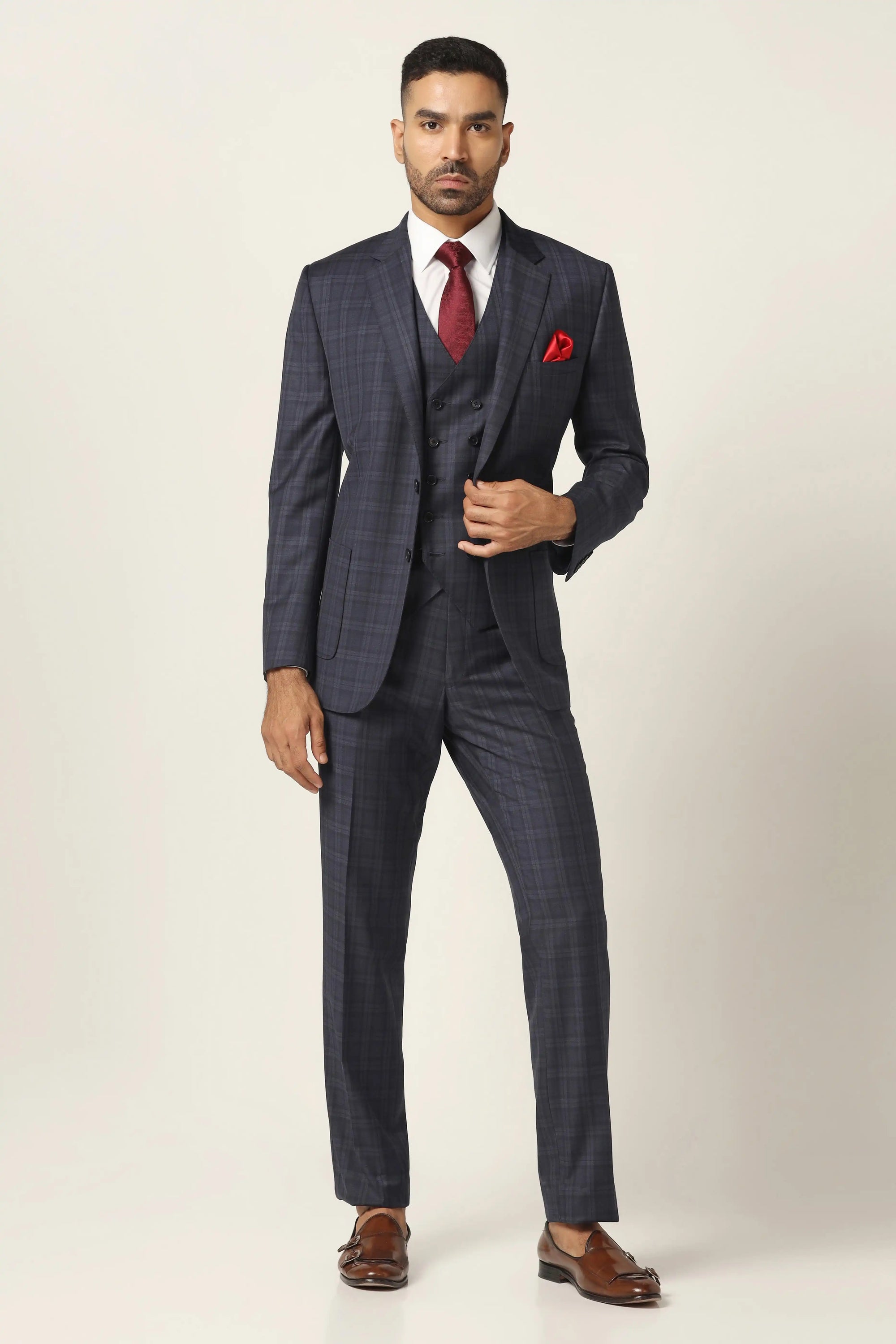 Redefine your style with our Navy Blue Checked Suit. Shop Now!