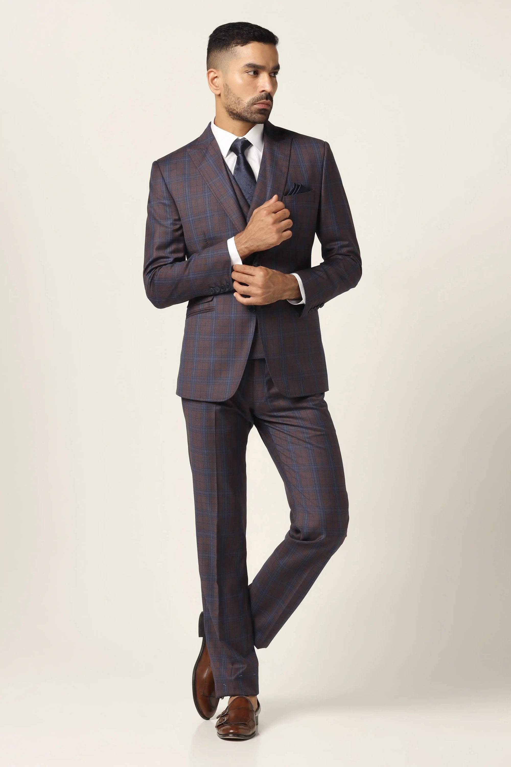 Dive into luxury with our premium fine wool blend 3-piece suit. Shop Now!