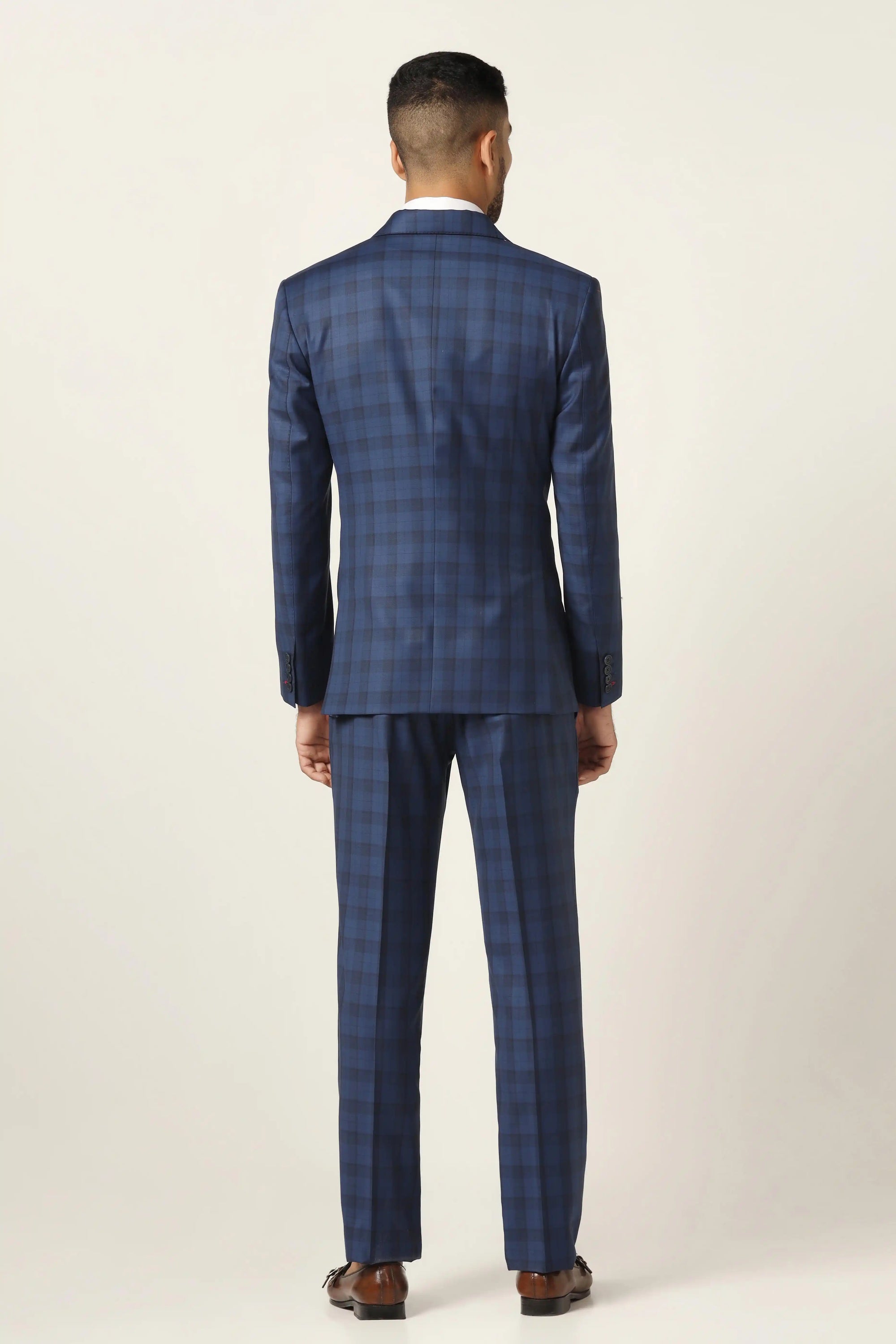 Upgrade your wardrobe with the Blue Checked Suit, perfect for any event. Shop Now!