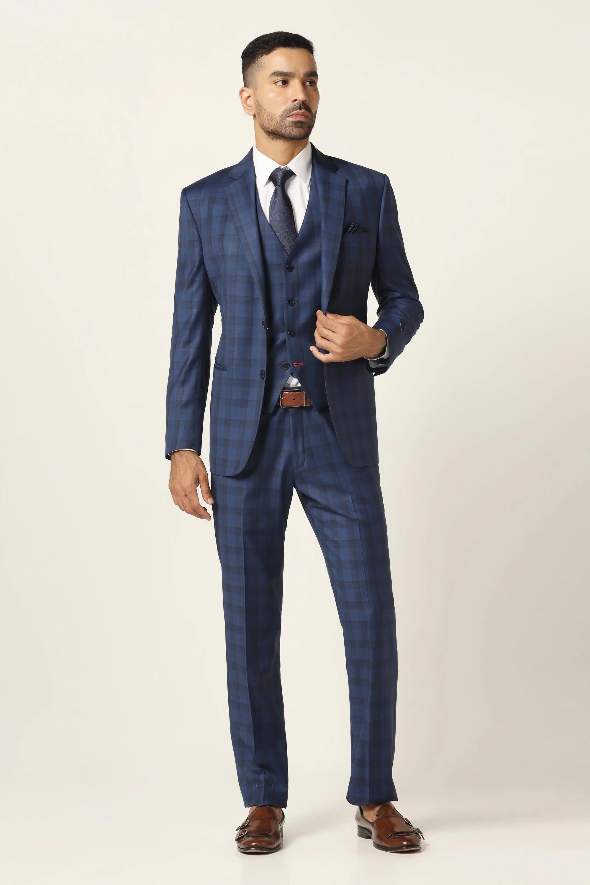 Upgrade your wardrobe with the Blue Checked Suit, perfect for any event. Shop Now!