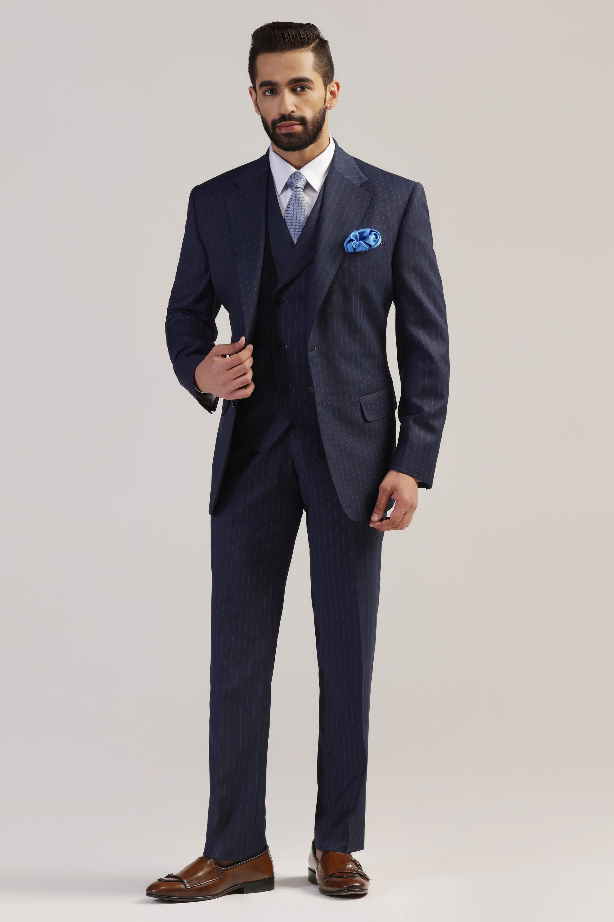 Upgrade your formal wardrobe with our Navy Pinstripe Suit. Shop Now!