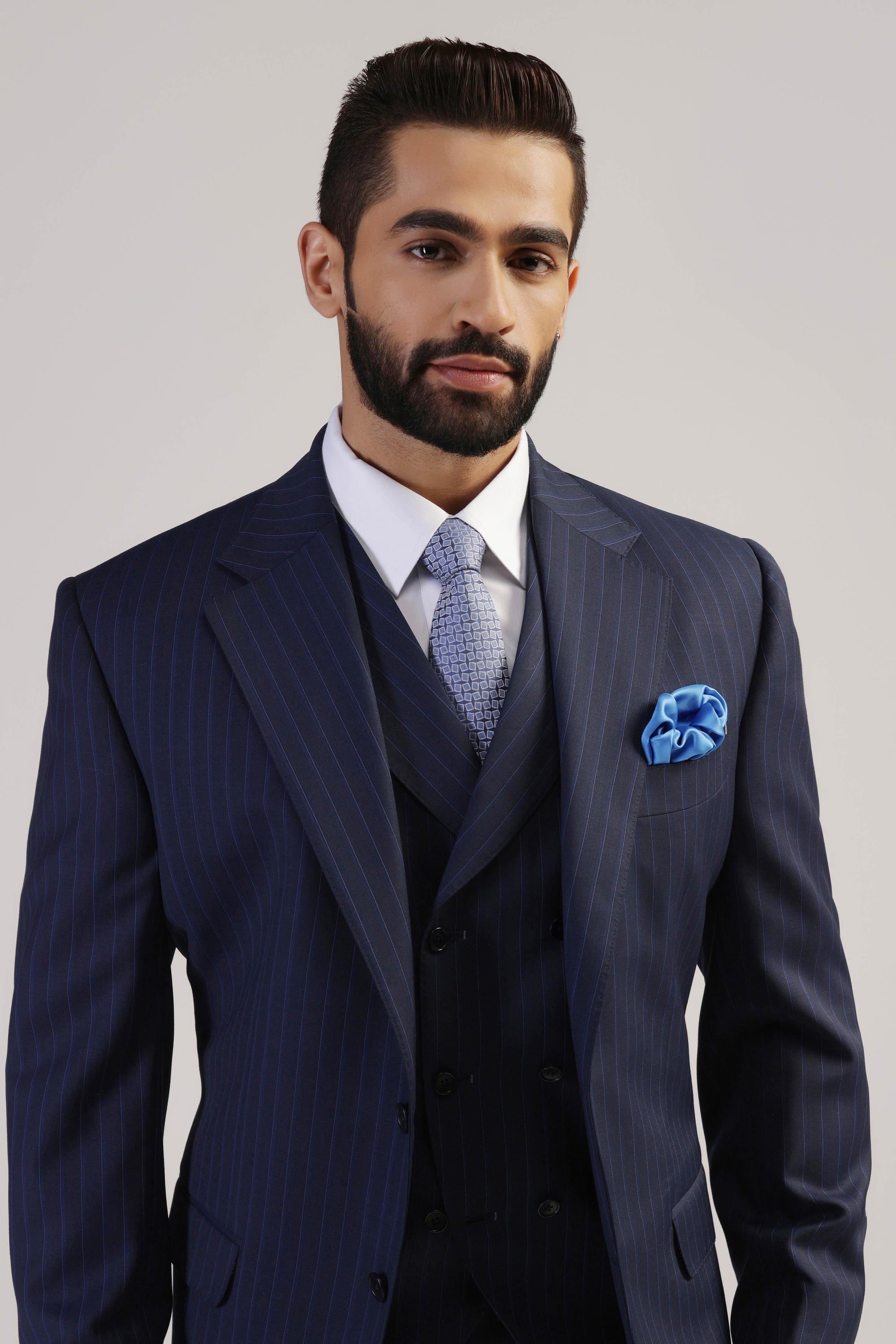 Upgrade your formal wardrobe with our Navy Pinstripe Suit. Shop Now!