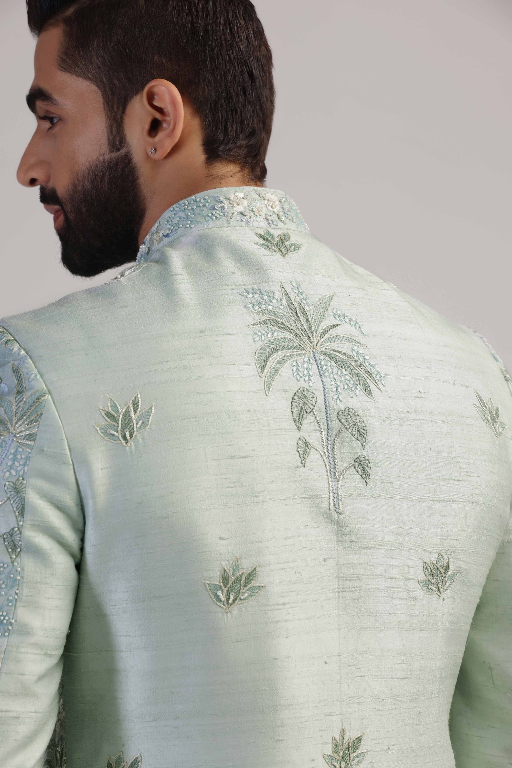 This light green embroidered bandhgala suit is a timeless and elegant choice. Shop Now!