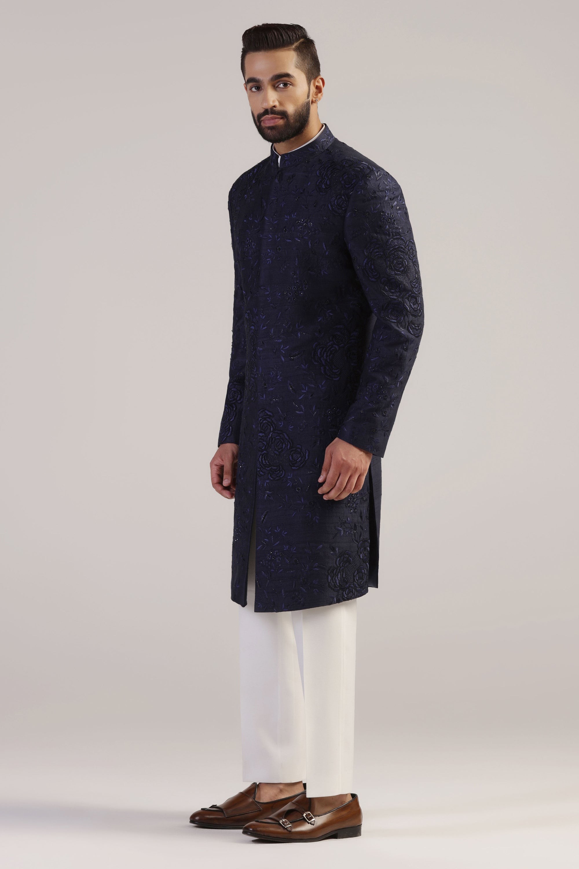 Take your formal attire to the next level with our Navy Embroidered Sherwani. Shop Now!