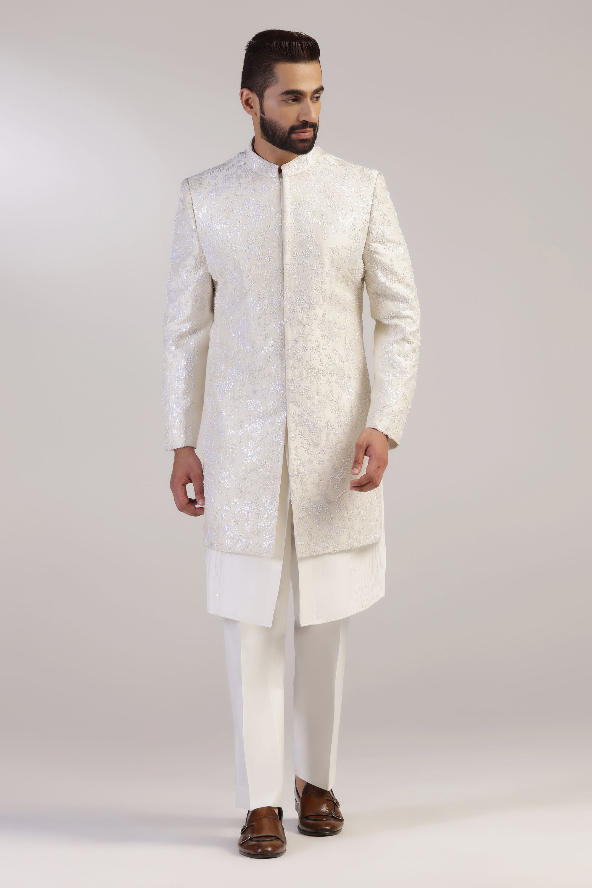 Experience the blend of traditional and modern with our Ivory Embroidered Indowestern!  Shop Now!