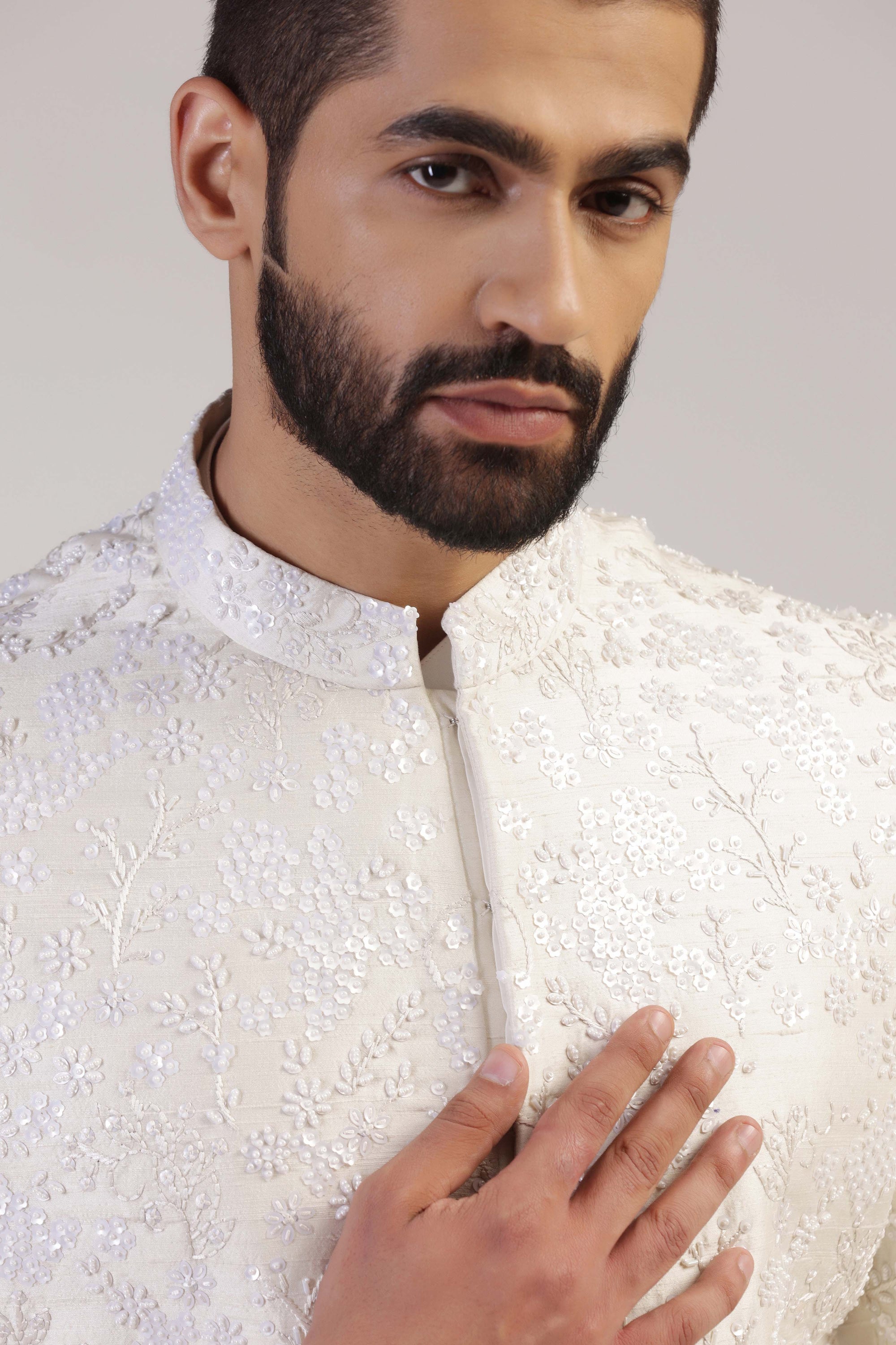 Experience the blend of traditional and modern with our Ivory Embroidered Indowestern!  Shop Now!