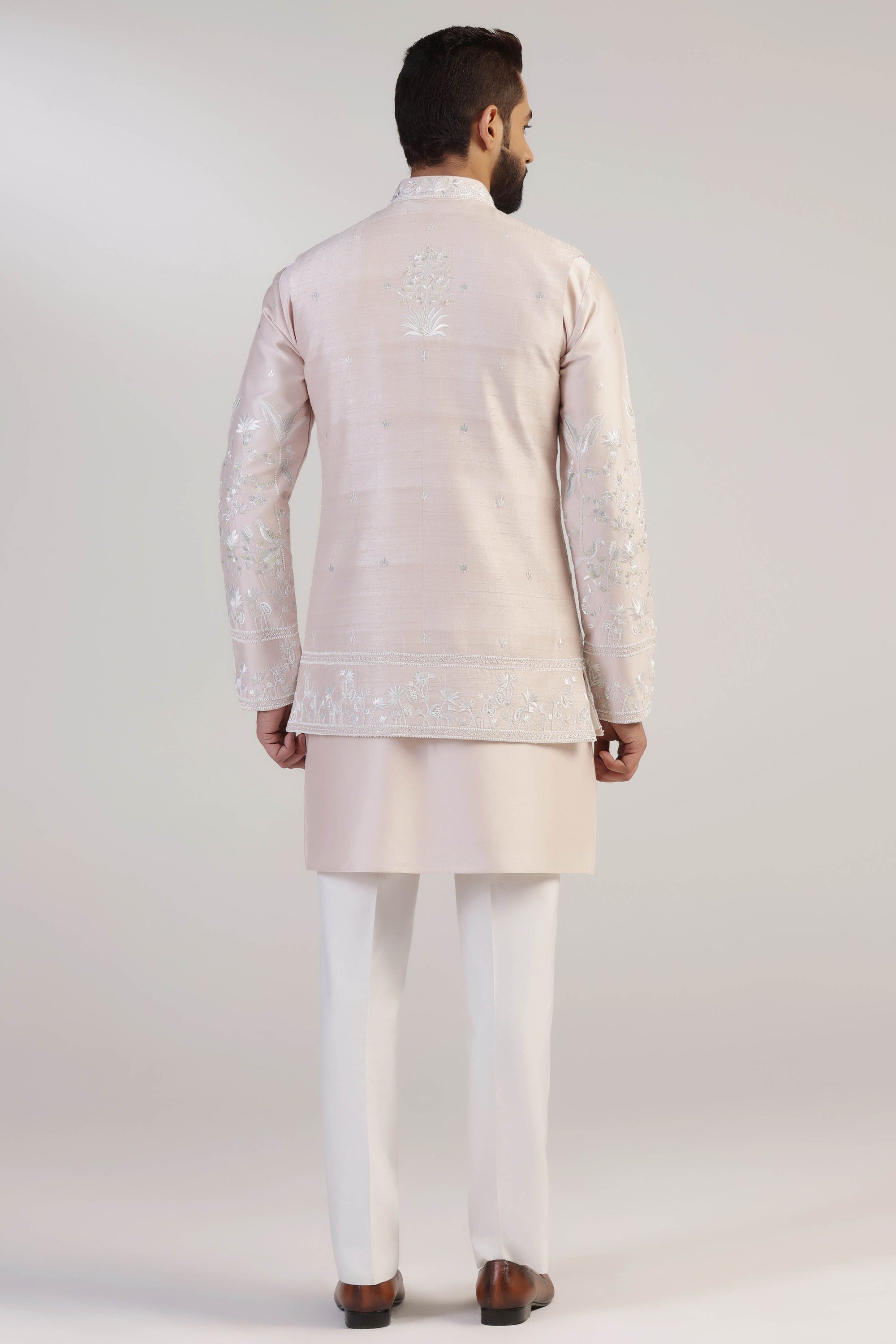 Upgrade your wardrobe with our Pink Embroidered Jacket Set. Shop Now!