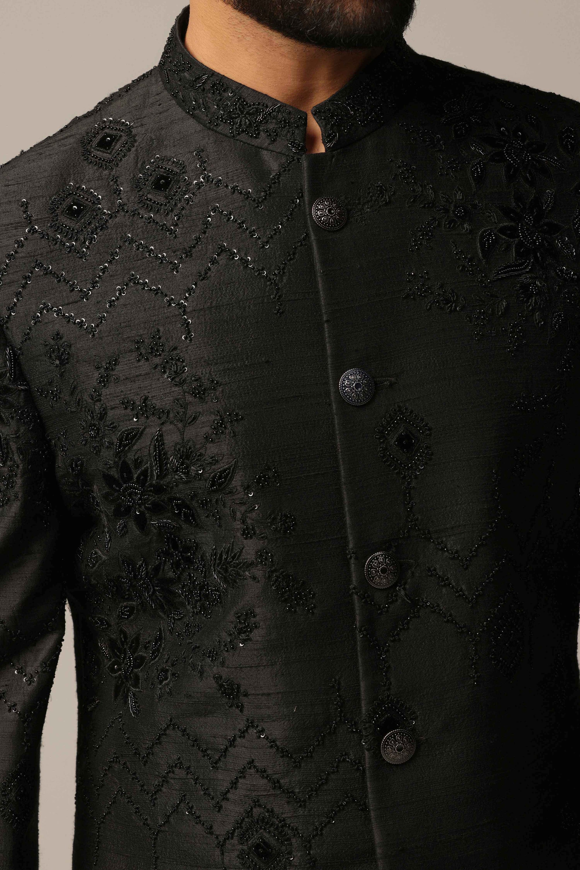 Experience elegance and luxury with our Black Embroidered Bandhgala suit. Shop Now!