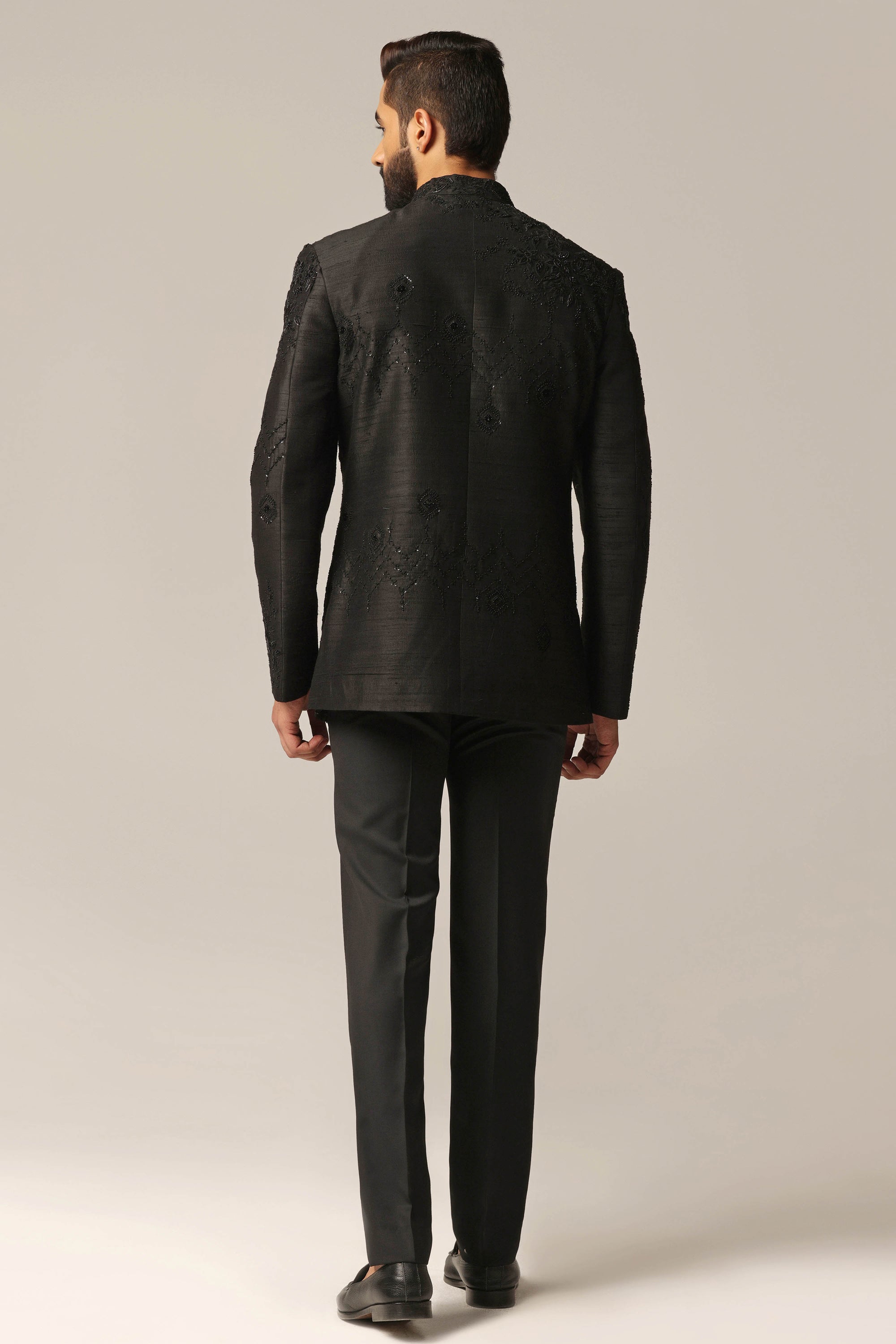 Experience elegance and luxury with our Black Embroidered Bandhgala suit. Shop Now!
