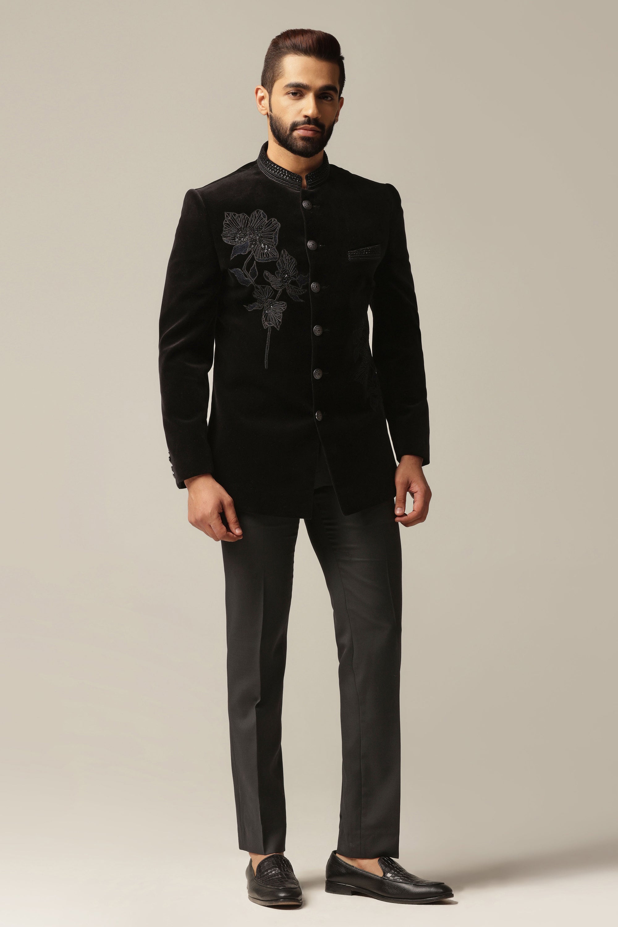 This Black Velvet Bandhgala Suit is made with soft and luxurious cotton velvet fabric. Shop Now!