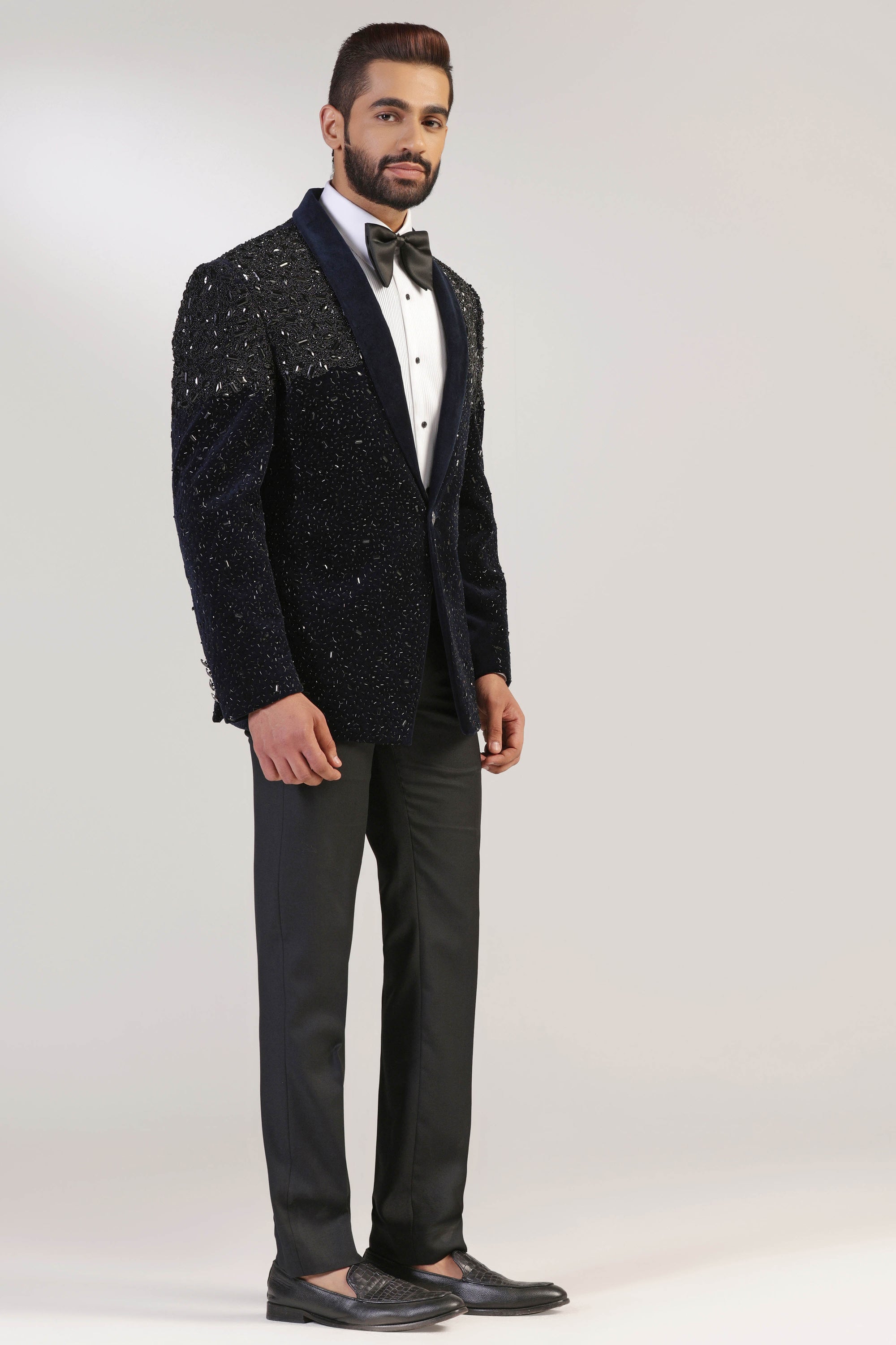 Expertly crafted from cotton velvet fabric, this navy tuxedo exudes a touch of luxury. Shop Now!