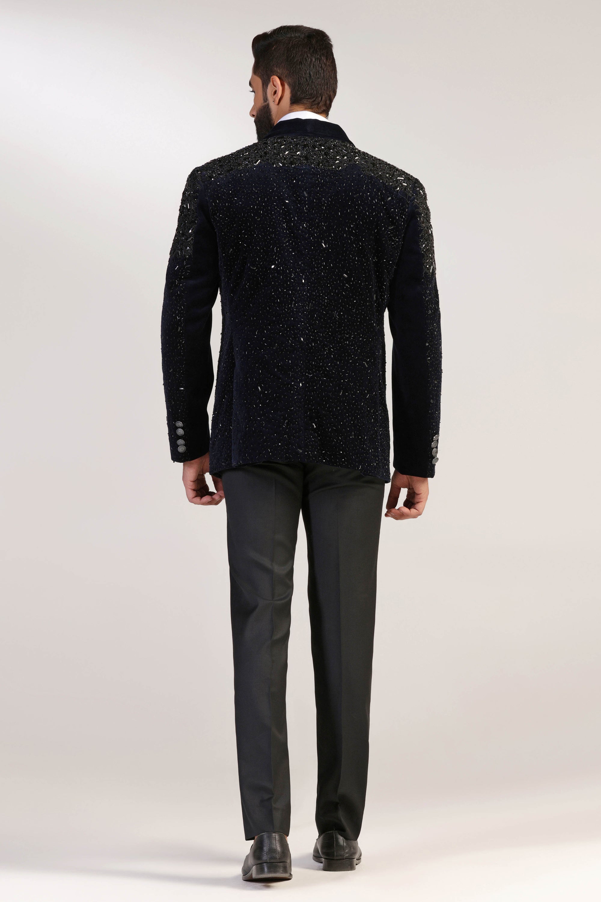 Expertly crafted from cotton velvet fabric, this navy tuxedo exudes a touch of luxury. Shop Now!