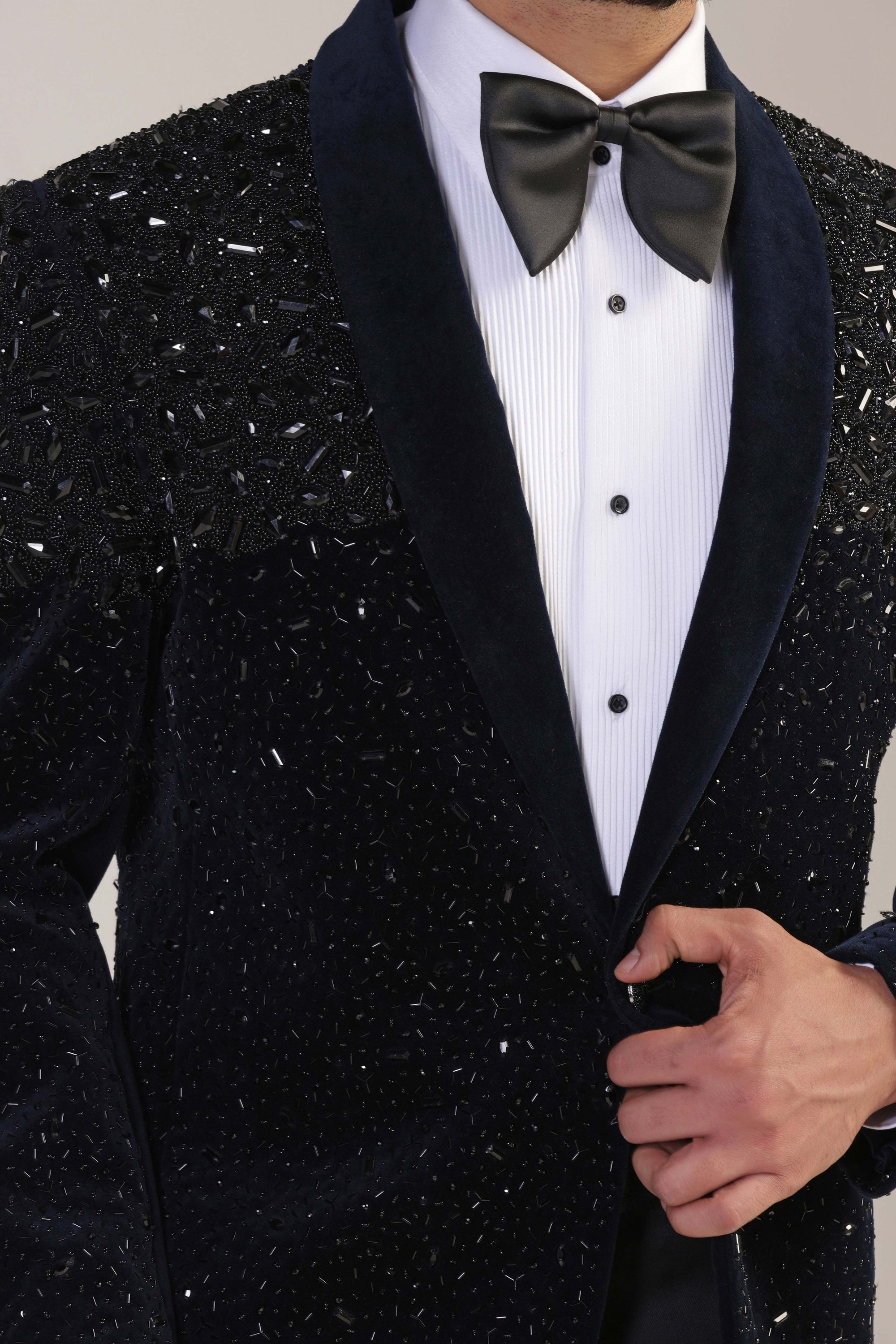 Expertly crafted from cotton velvet fabric, this navy tuxedo exudes a touch of luxury. Shop Now!