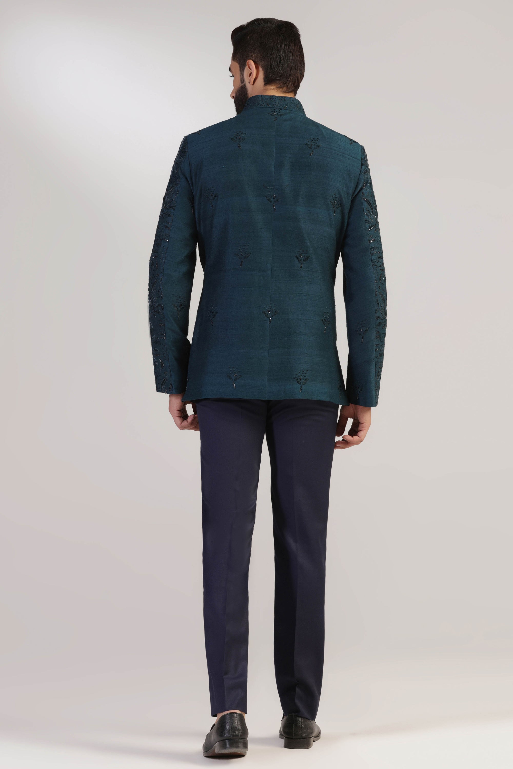 Elevate your formal attire with our Green Embroidered Bandhgala suit. Shop Now!