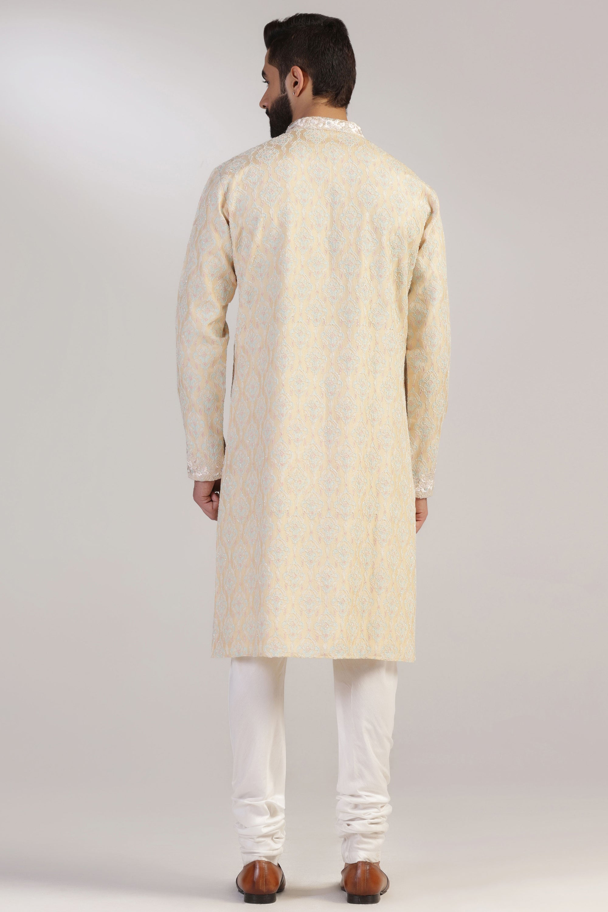 This Yellow Multicolour Kurta Pajama is made from luxurious silk fabric. Shop Now!