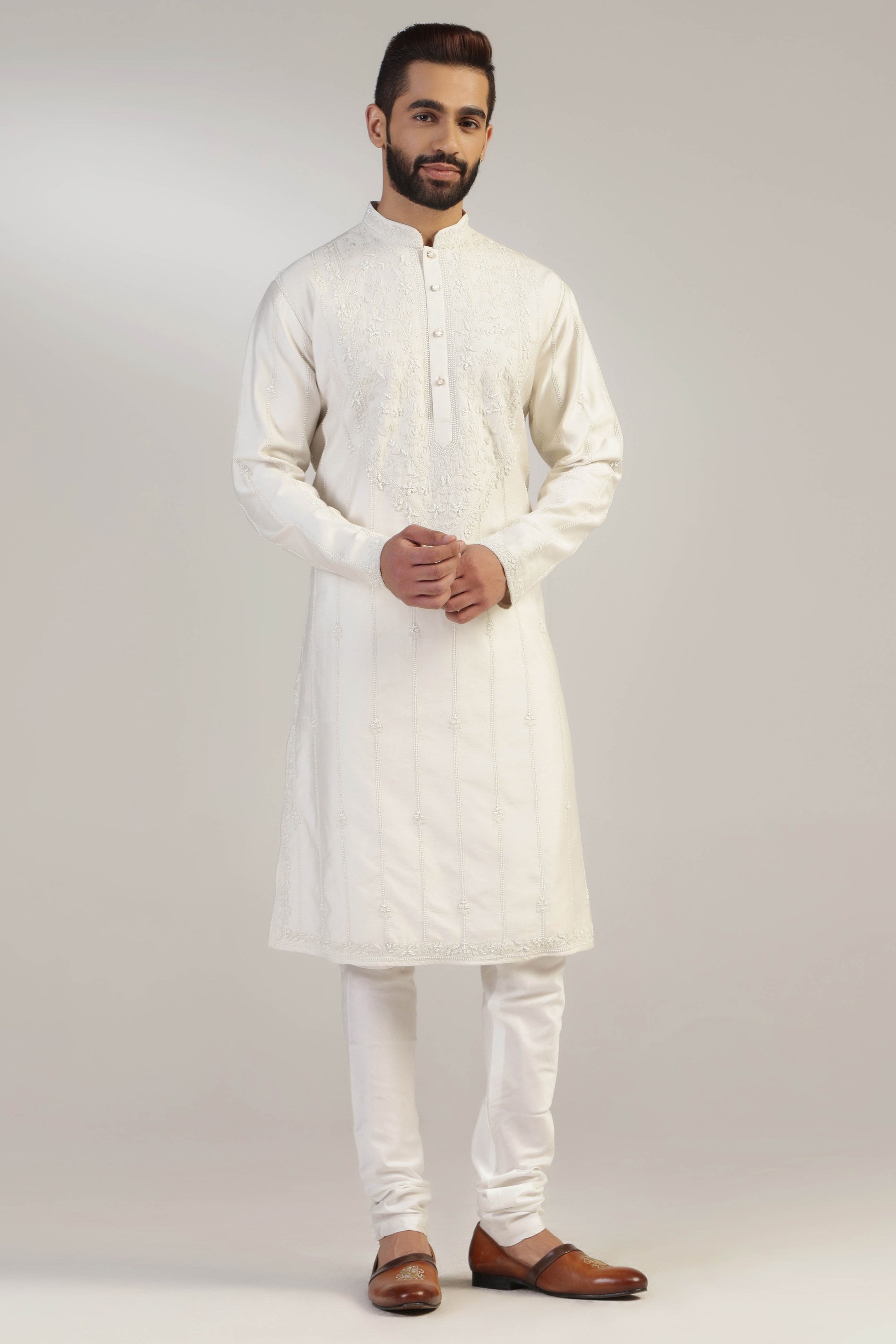Crafted in chanderi silk, this Embroidered Kurta Set exudes elegance and sophistication. Shop Now!