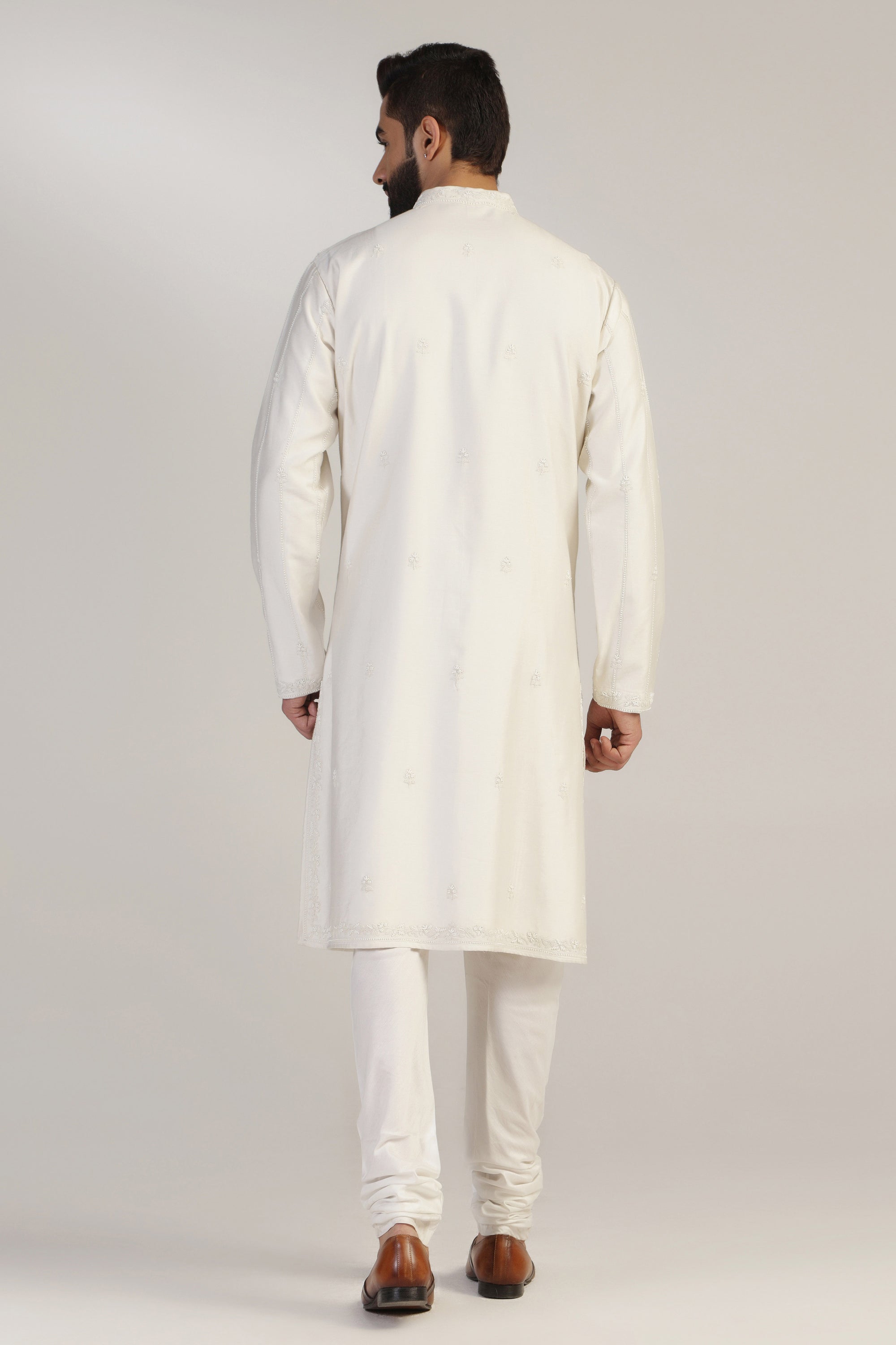 Crafted in chanderi silk, this Embroidered Kurta Set exudes elegance and sophistication. Shop Now!