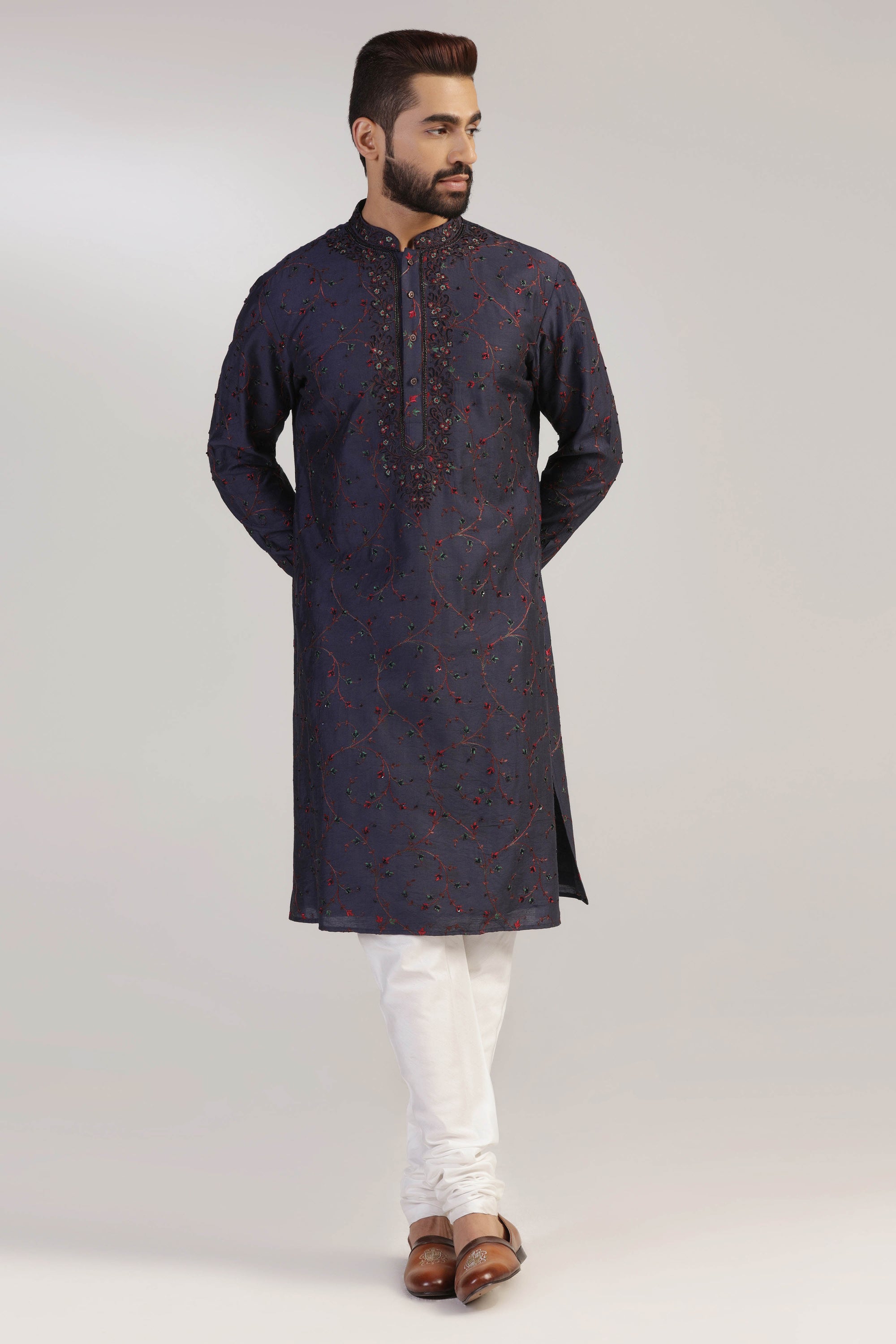 Crafted from fabric, this Navy Embroidered Kurta Set is the epitome of sophistication. Shop Now!