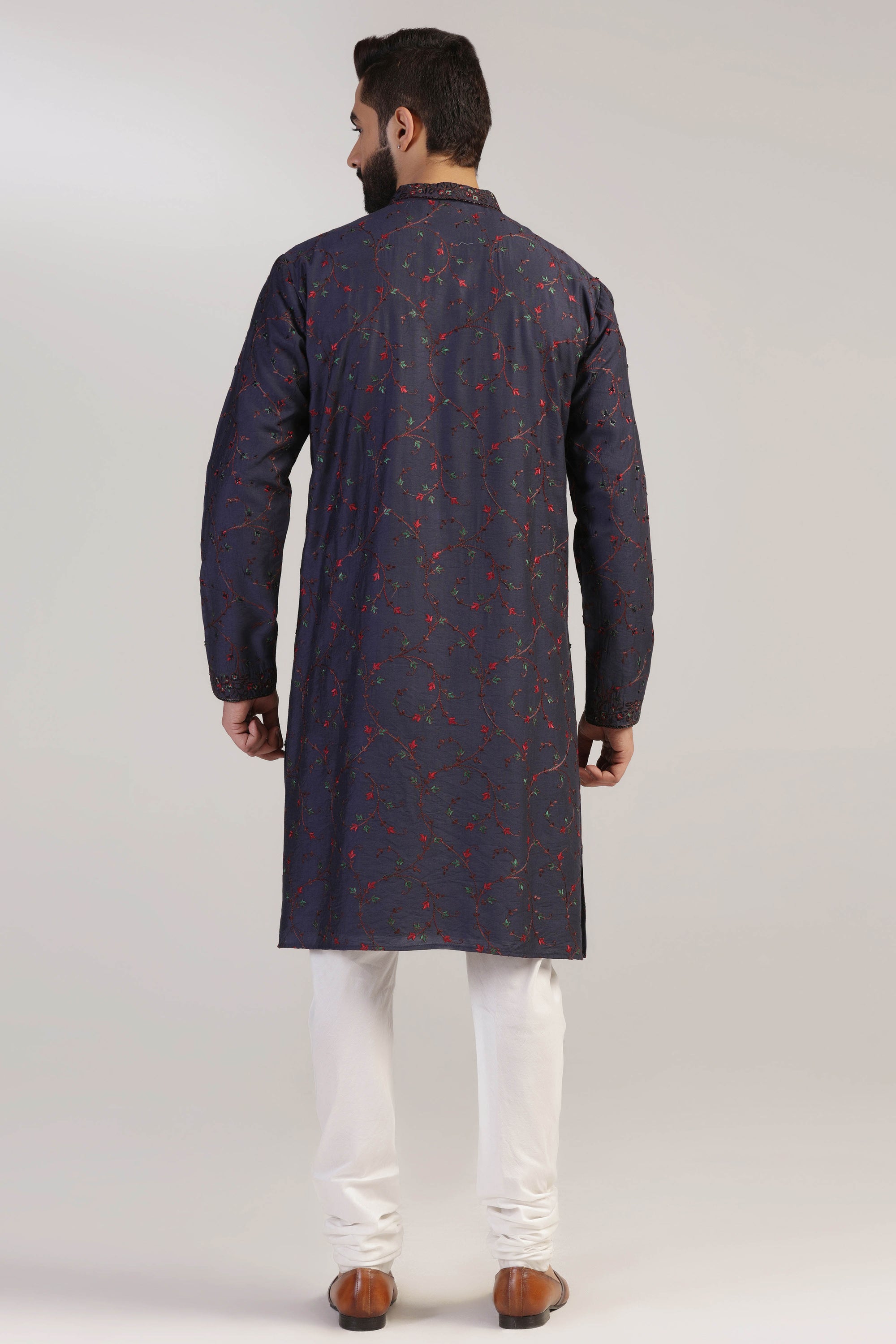 Crafted from fabric, this Navy Embroidered Kurta Set is the epitome of sophistication. Shop Now!