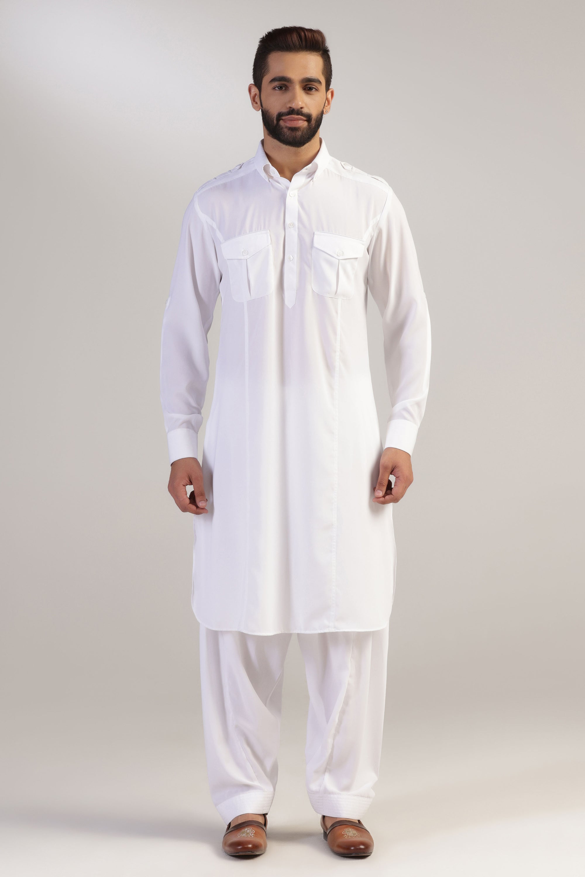 This traditional white pathani suit is made with micro fabric for a comfortable fit. Shop Now!