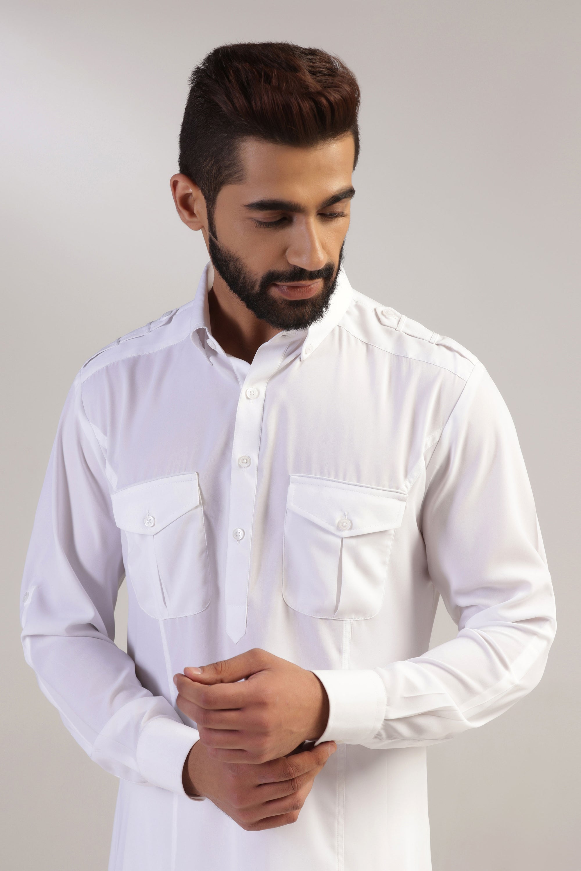 This traditional white pathani suit is made with micro fabric for a comfortable fit. Shop Now!