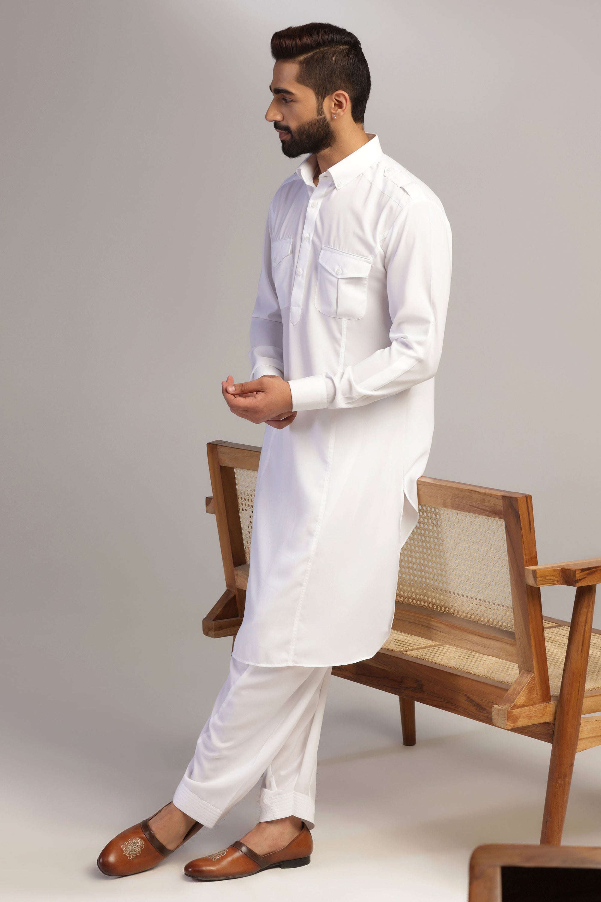This traditional white pathani suit is made with micro fabric for a comfortable fit. Shop Now!