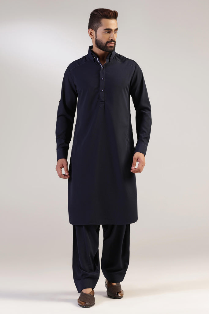 This navy Pathani suit, made in micro fabric, is a timeless addition to your wardrobe. Shop Now!