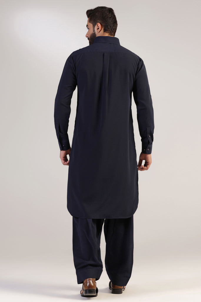 This navy Pathani suit, made in micro fabric, is a timeless addition to your wardrobe. Shop Now!