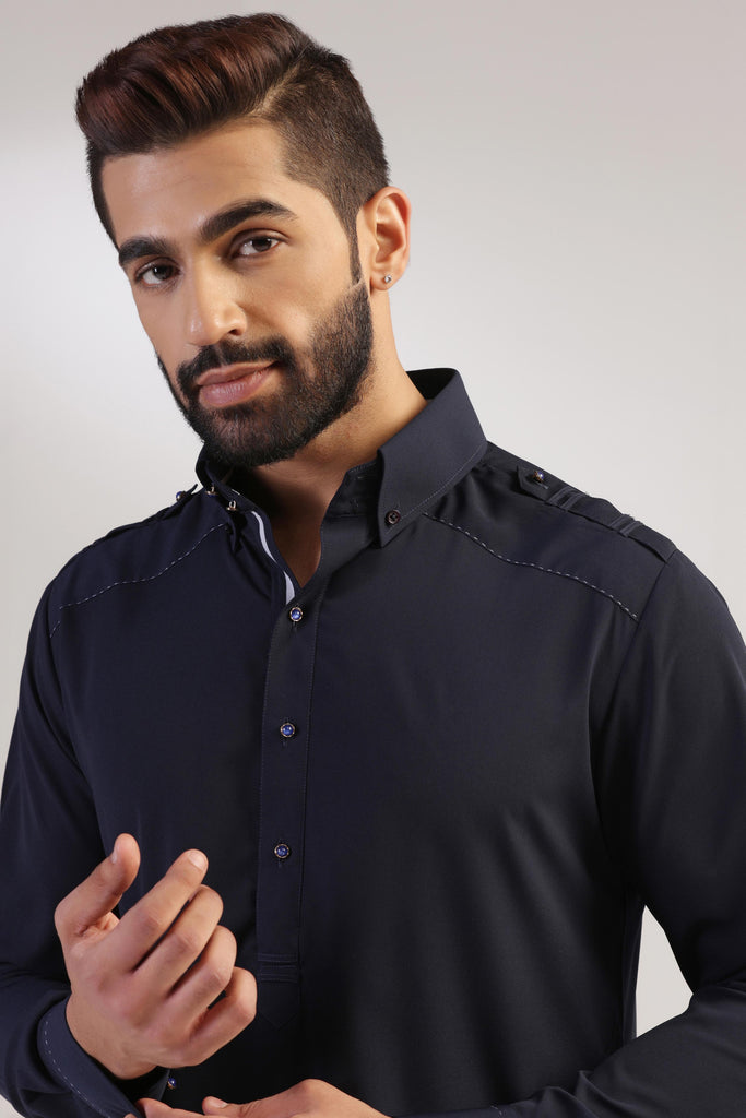 This navy Pathani suit, made in micro fabric, is a timeless addition to your wardrobe. Shop Now!
