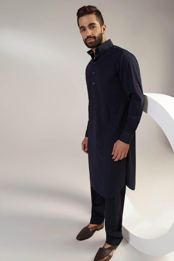 This navy Pathani suit, made in micro fabric, is a timeless addition to your wardrobe. Shop Now!