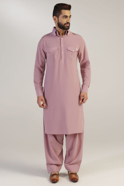 This Suit boasts traditional elements such as shoulder flaps, pleated chest pockets. Shop Now!