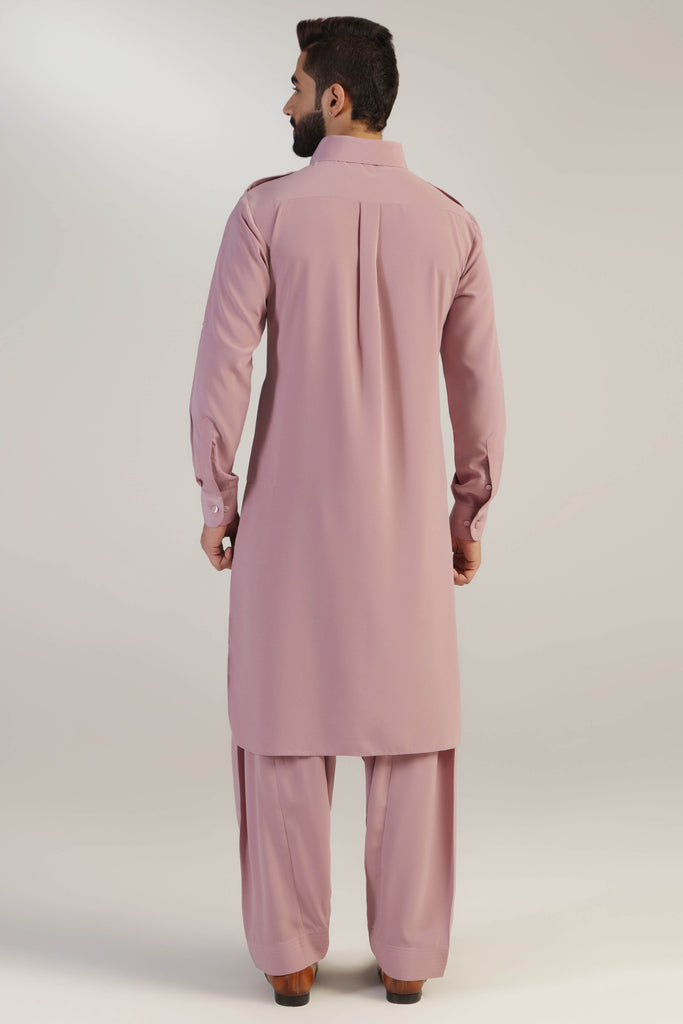 This Suit boasts traditional elements such as shoulder flaps, pleated chest pockets. Shop Now!