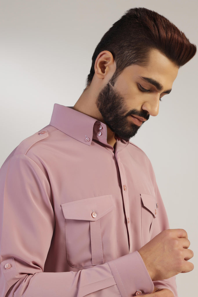 This Suit boasts traditional elements such as shoulder flaps, pleated chest pockets. Shop Now!