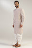 This attire is of fine raw silk fabric, featuring intricate thread and bead embroidery. Shop Now!