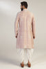This attire is of fine raw silk fabric, featuring intricate thread and bead embroidery. Shop Now!