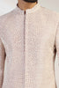 This attire is of fine raw silk fabric, featuring intricate thread and bead embroidery. Shop Now!