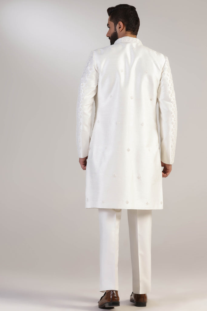 This Indowestern is from raw silk fabric, featuring tonal thread and bead embroidery. Shop Now!