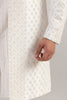 This Indowestern is from raw silk fabric, featuring tonal thread and bead embroidery. Shop Now!