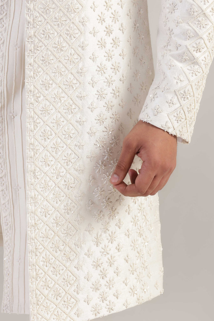 This Indowestern is from raw silk fabric, featuring tonal thread and bead embroidery. Shop Now!